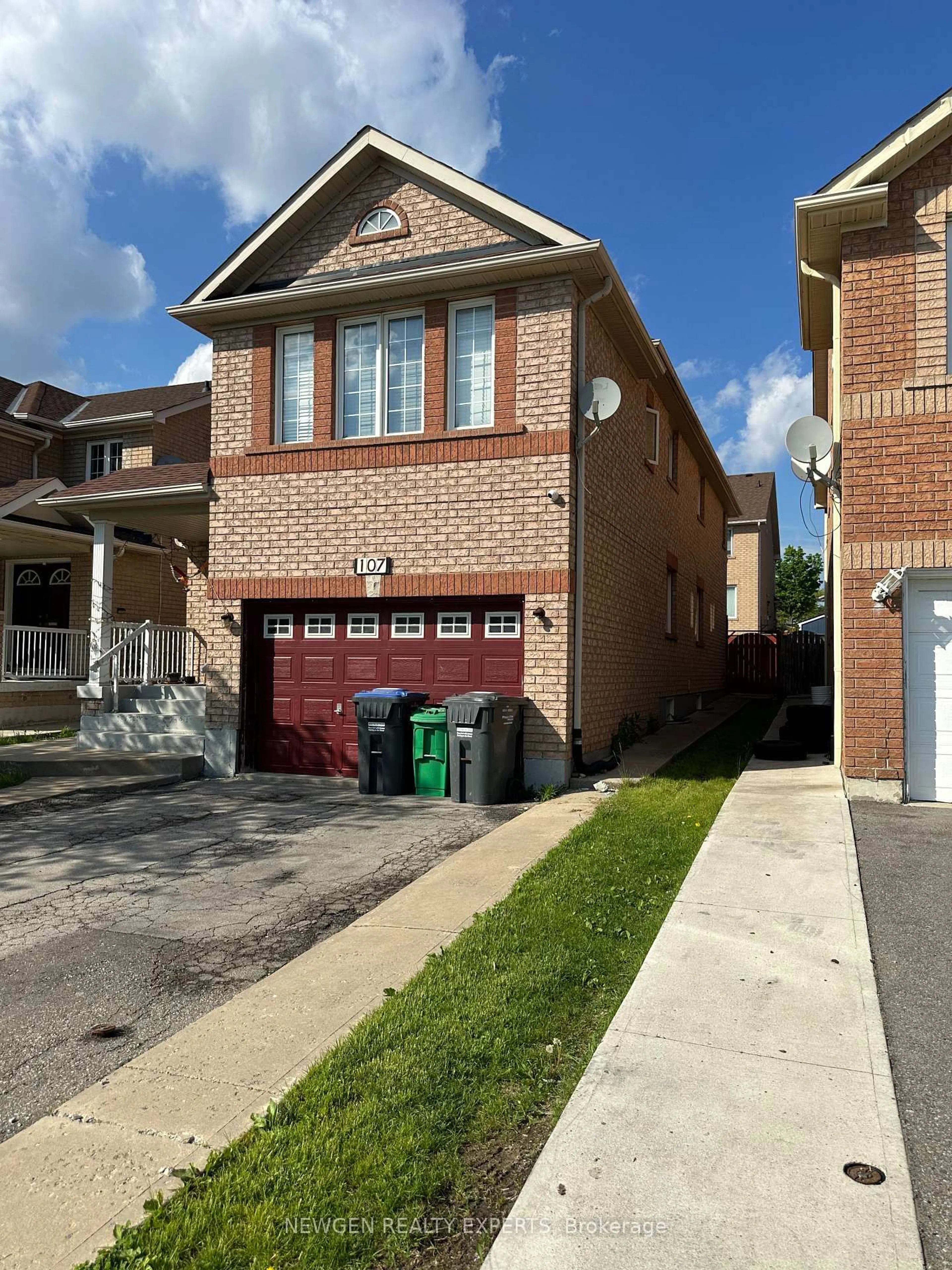 Home with brick exterior material, street for 107 Rollingwood Dr, Brampton Ontario L6Y 5P9