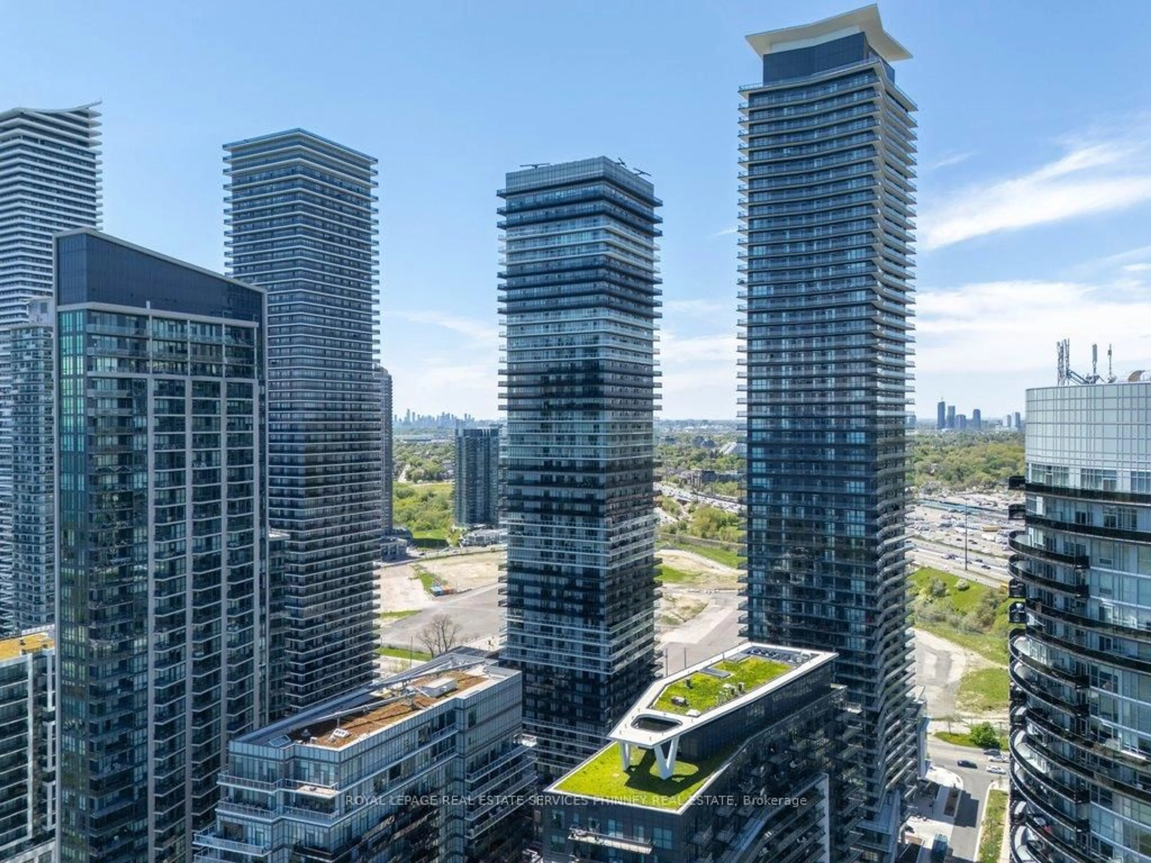 A pic from outside/outdoor area/front of a property/back of a property/a pic from drone, city buildings view from balcony for 56 Annie Craig Dr #4502, Toronto Ontario M8V 0C8