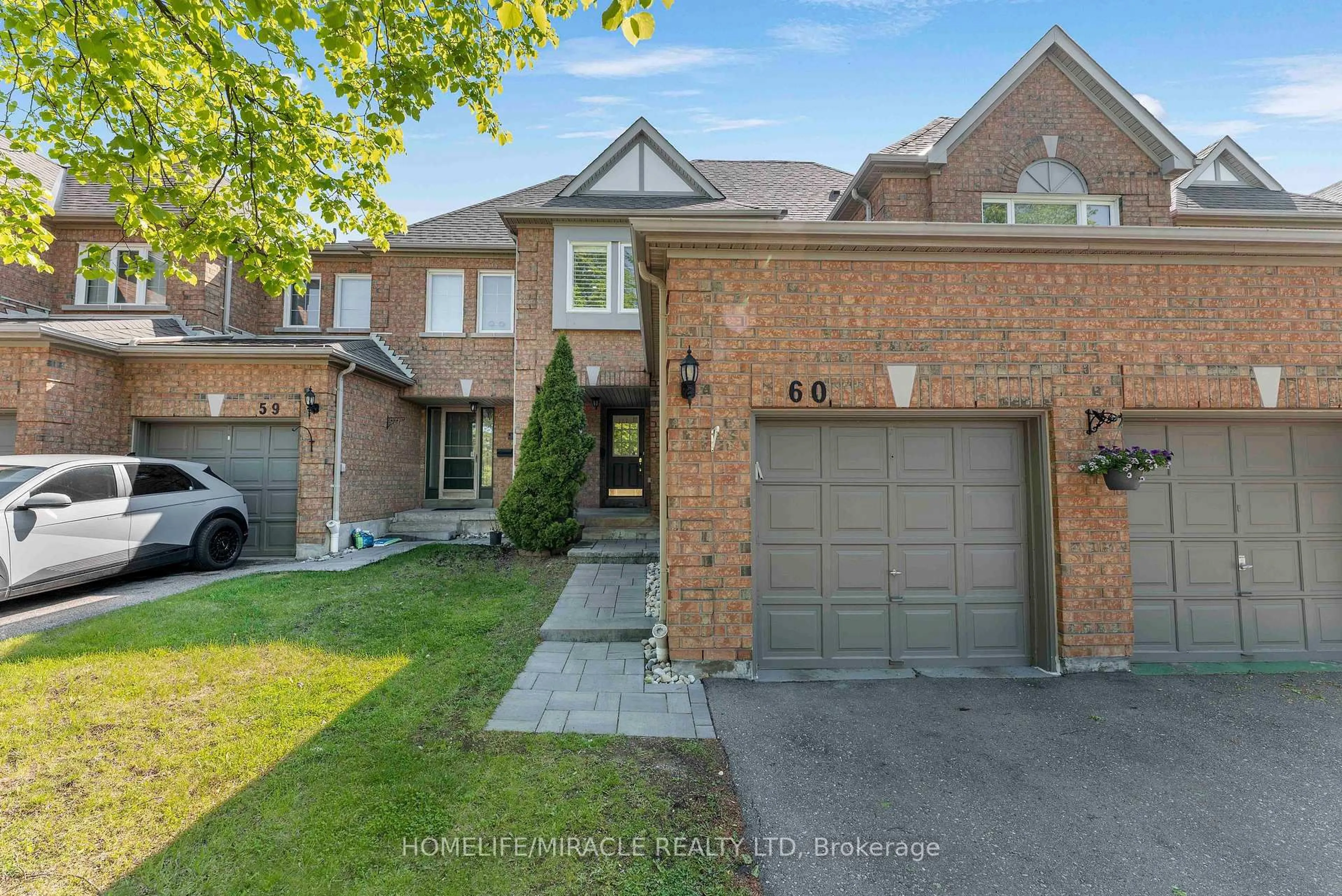 Home with brick exterior material, street for 5230 Glen Erin Dr #60, Mississauga Ontario L5M 5Z7