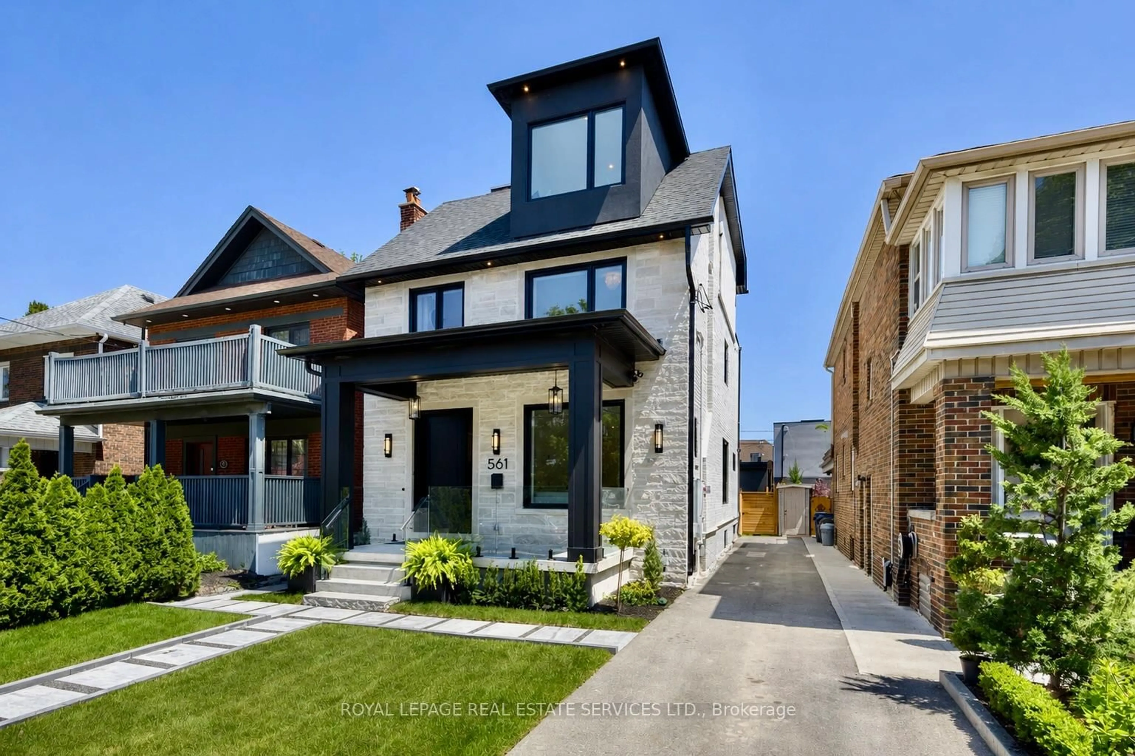 Home with brick exterior material, street for 561 Durie St, Toronto Ontario M6S 3H2
