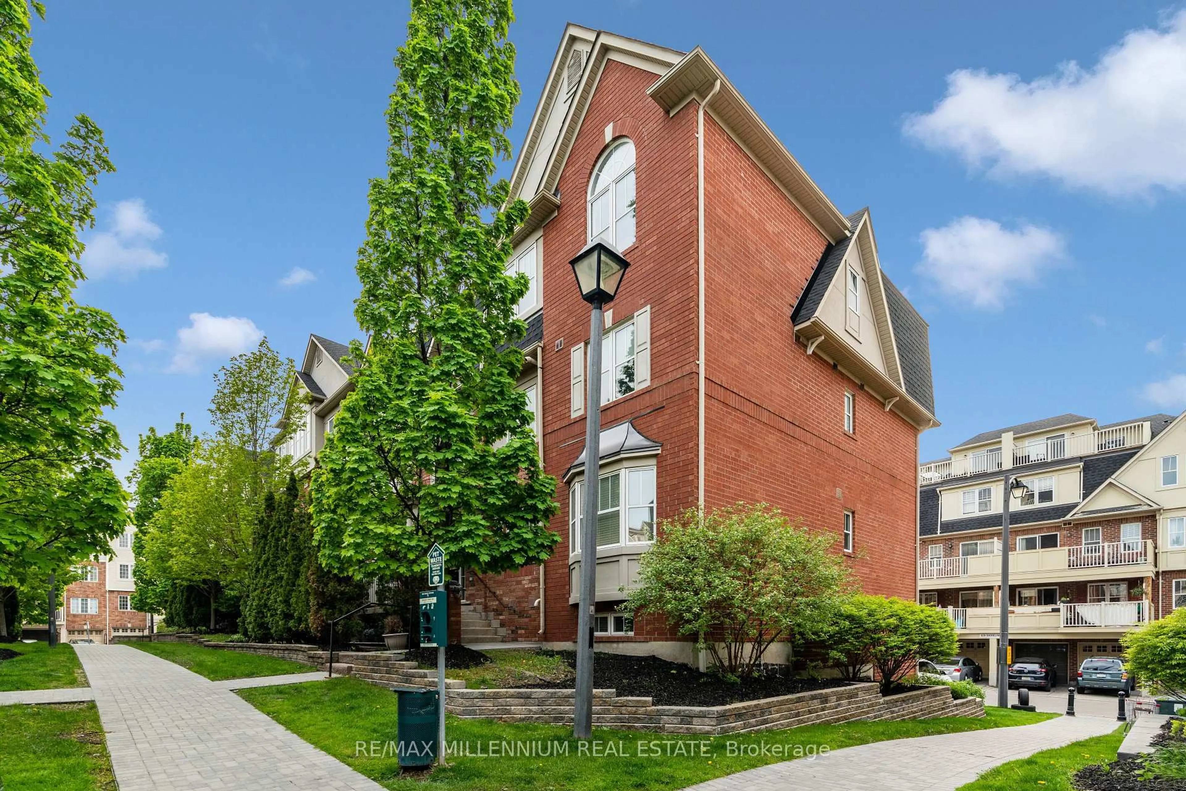 Home with brick exterior material, street for 774 Neighbourhood Circ #4, Mississauga Ontario L5B 0B6