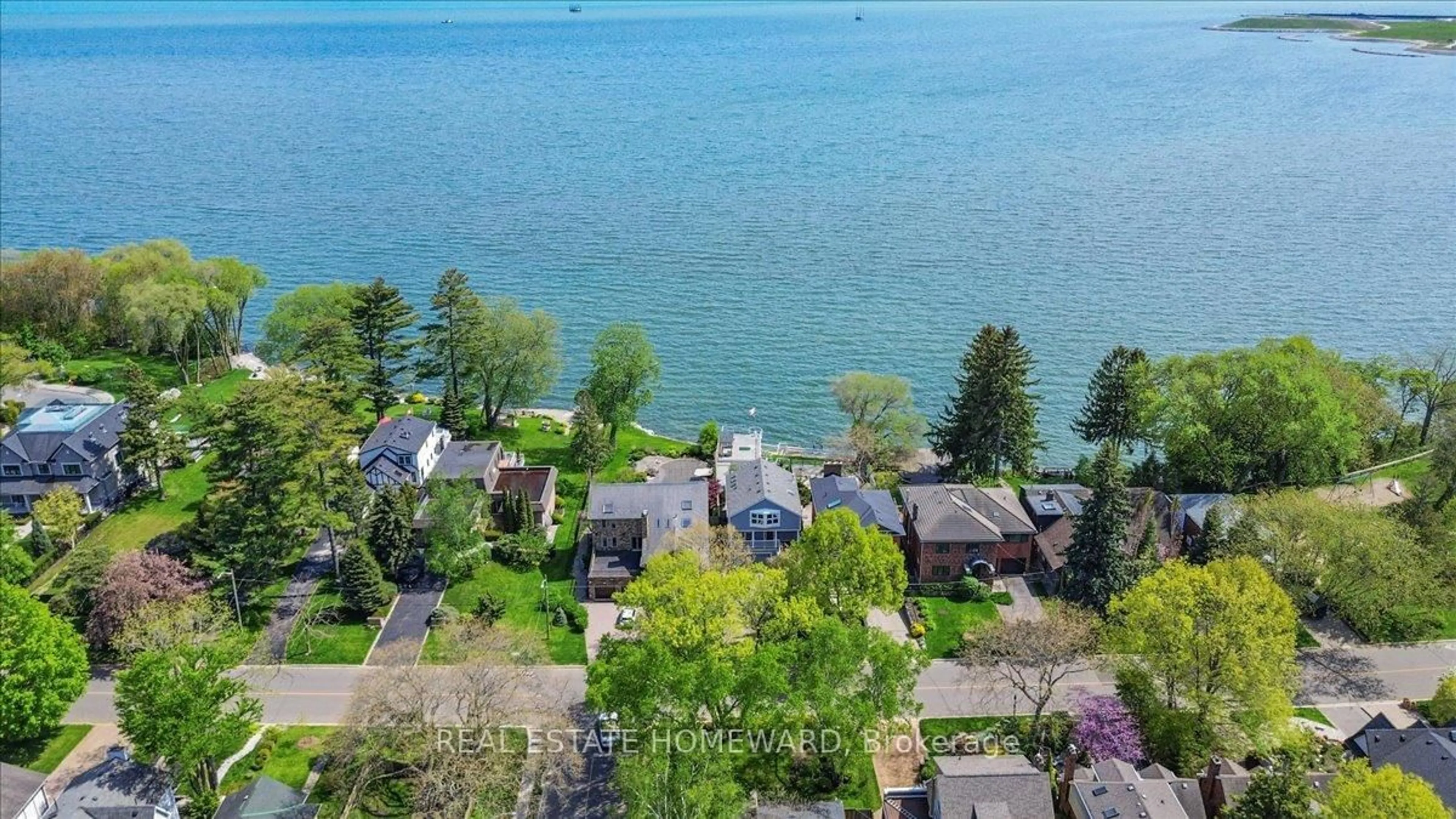 A pic from outside/outdoor area/front of a property/back of a property/a pic from drone, water/lake/river/ocean view for 12 Thirty Seventh St, Toronto Ontario M8W 3L6