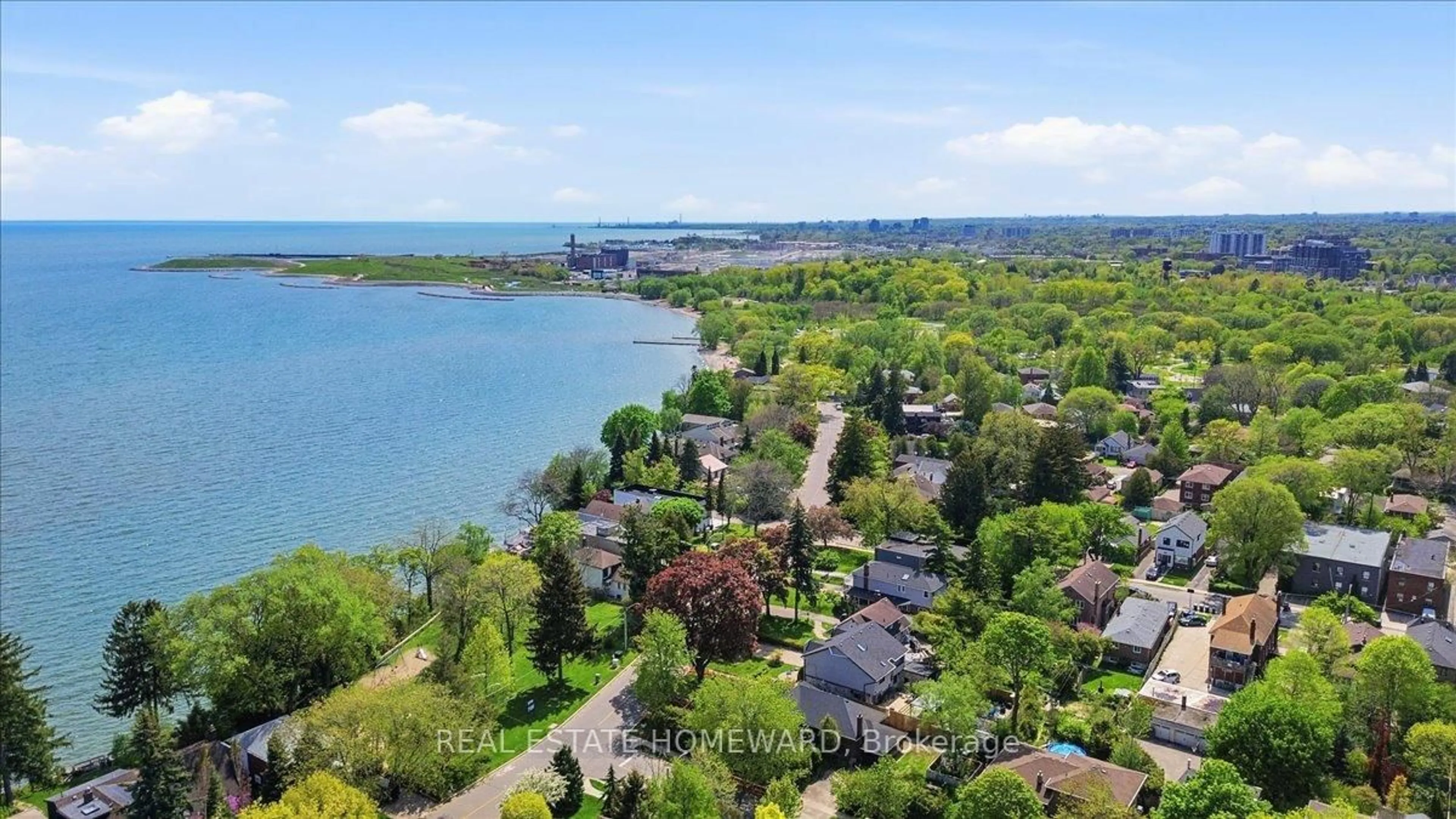 A pic from outside/outdoor area/front of a property/back of a property/a pic from drone, water/lake/river/ocean view for 12 Thirty Seventh St, Toronto Ontario M8W 3L6