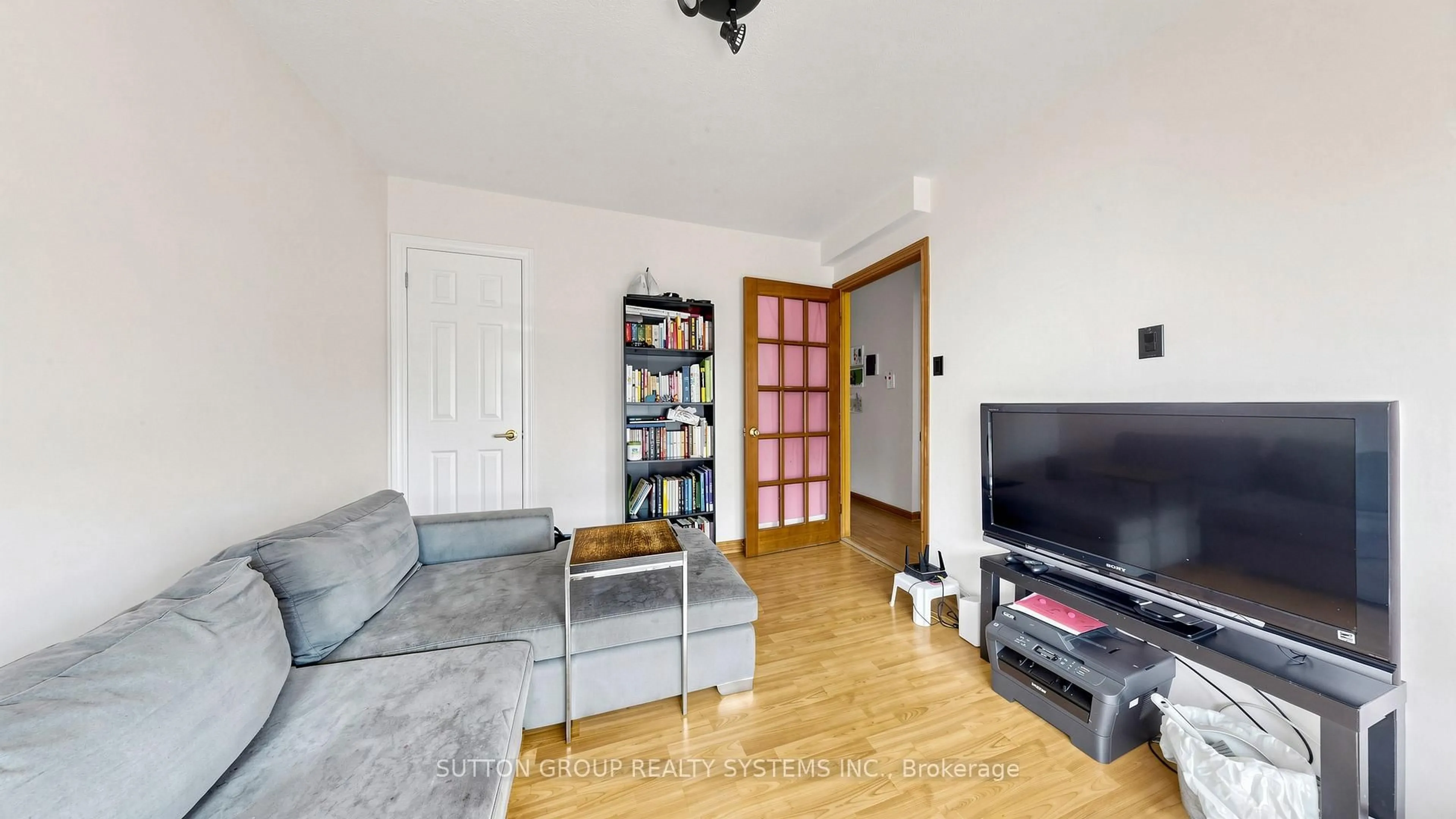 Living room with furniture, wood/laminate floor for 289D Bartlett Ave, Toronto Ontario M6H 3G3