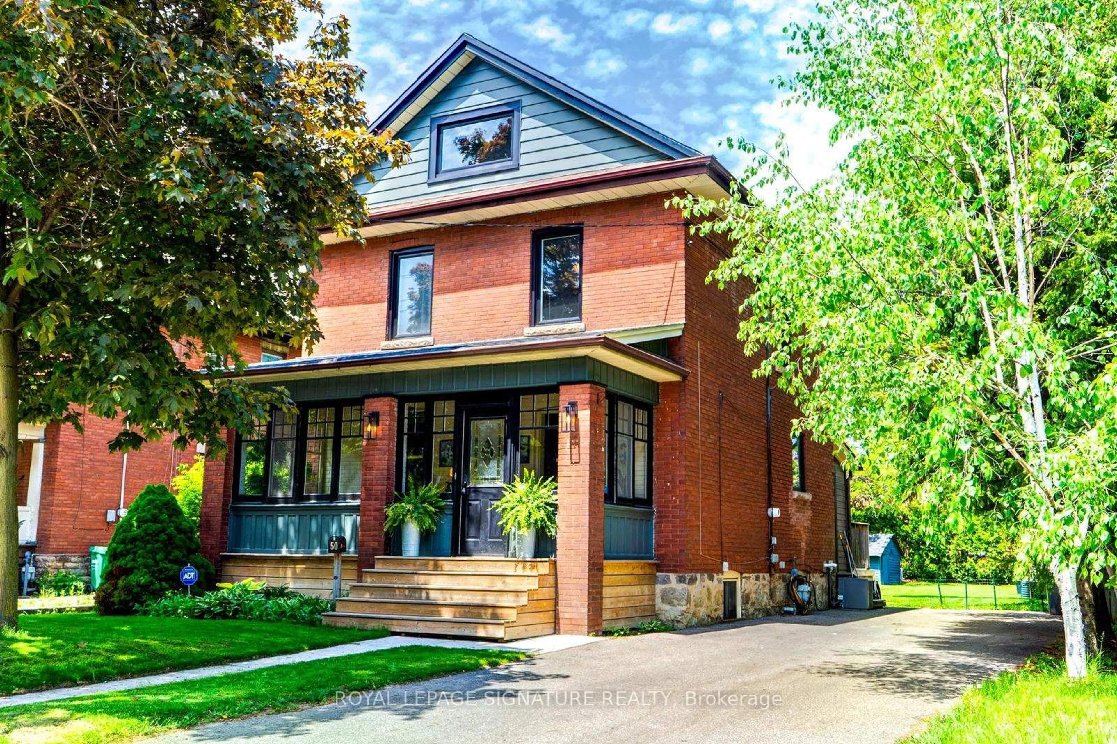 Home with brick exterior material, street for 50 Rosedale Ave, Brampton Ontario L6X 1K1