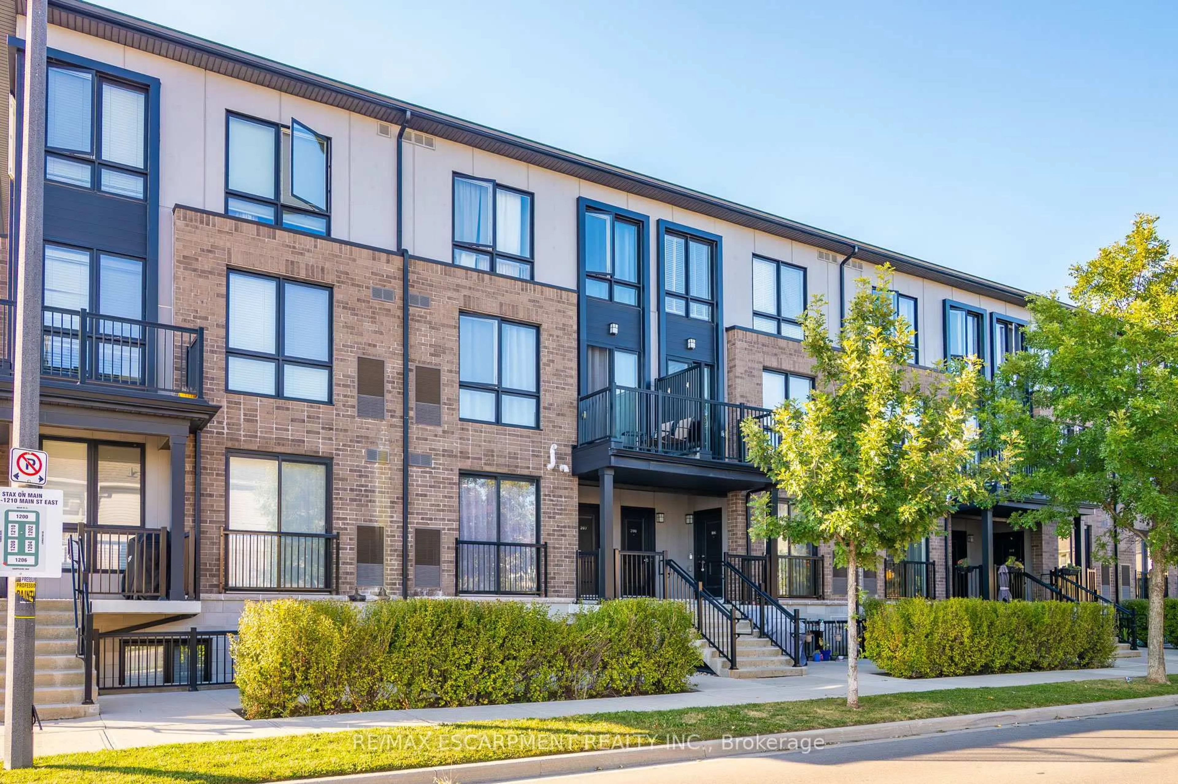 Home with brick exterior material, street for 1206 Main St #107, Milton Ontario L9T 9K6