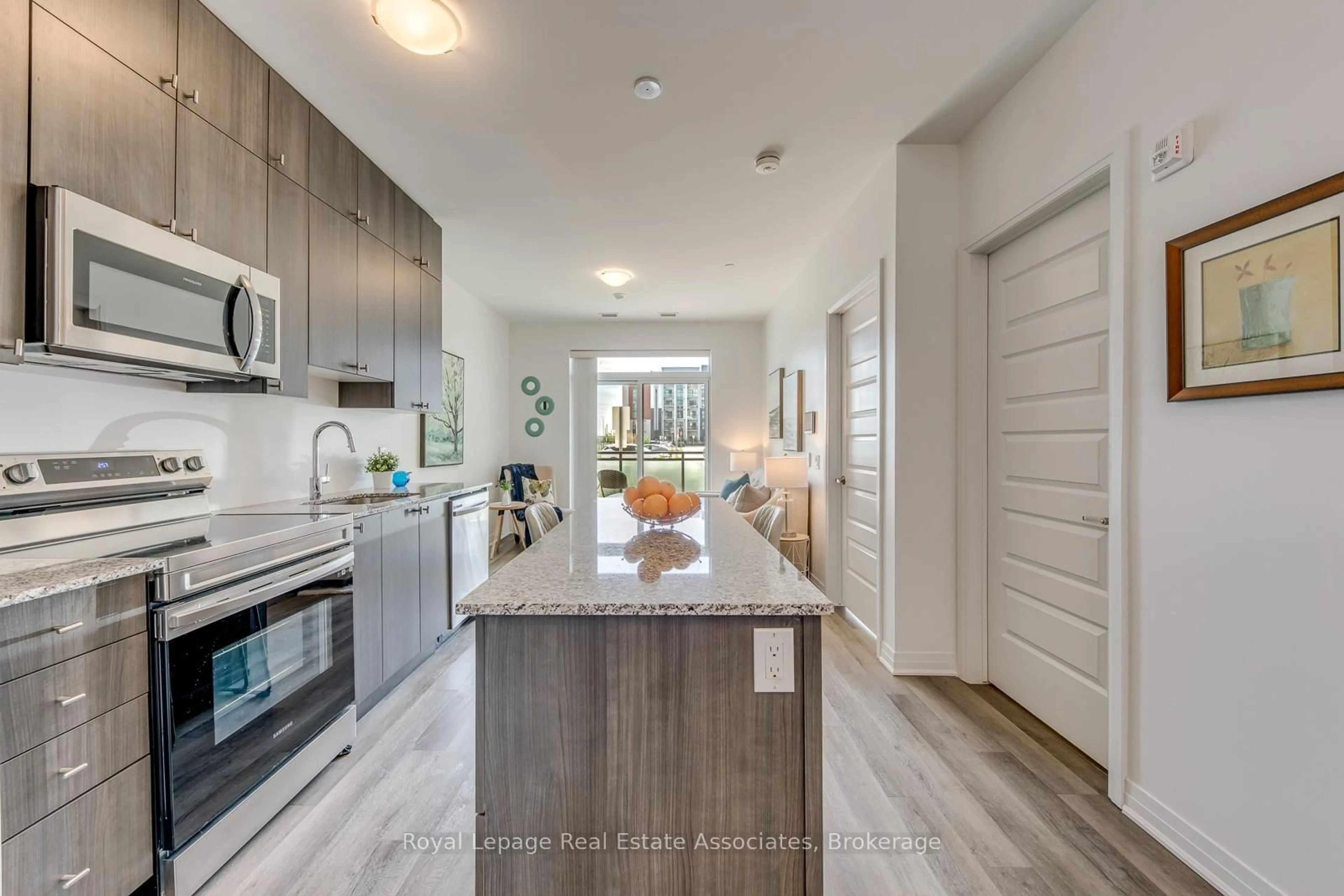 Open concept kitchen, ceramic/tile floor for 460 Gordon Krantz Ave #108, Milton Ontario L9E 1Z2
