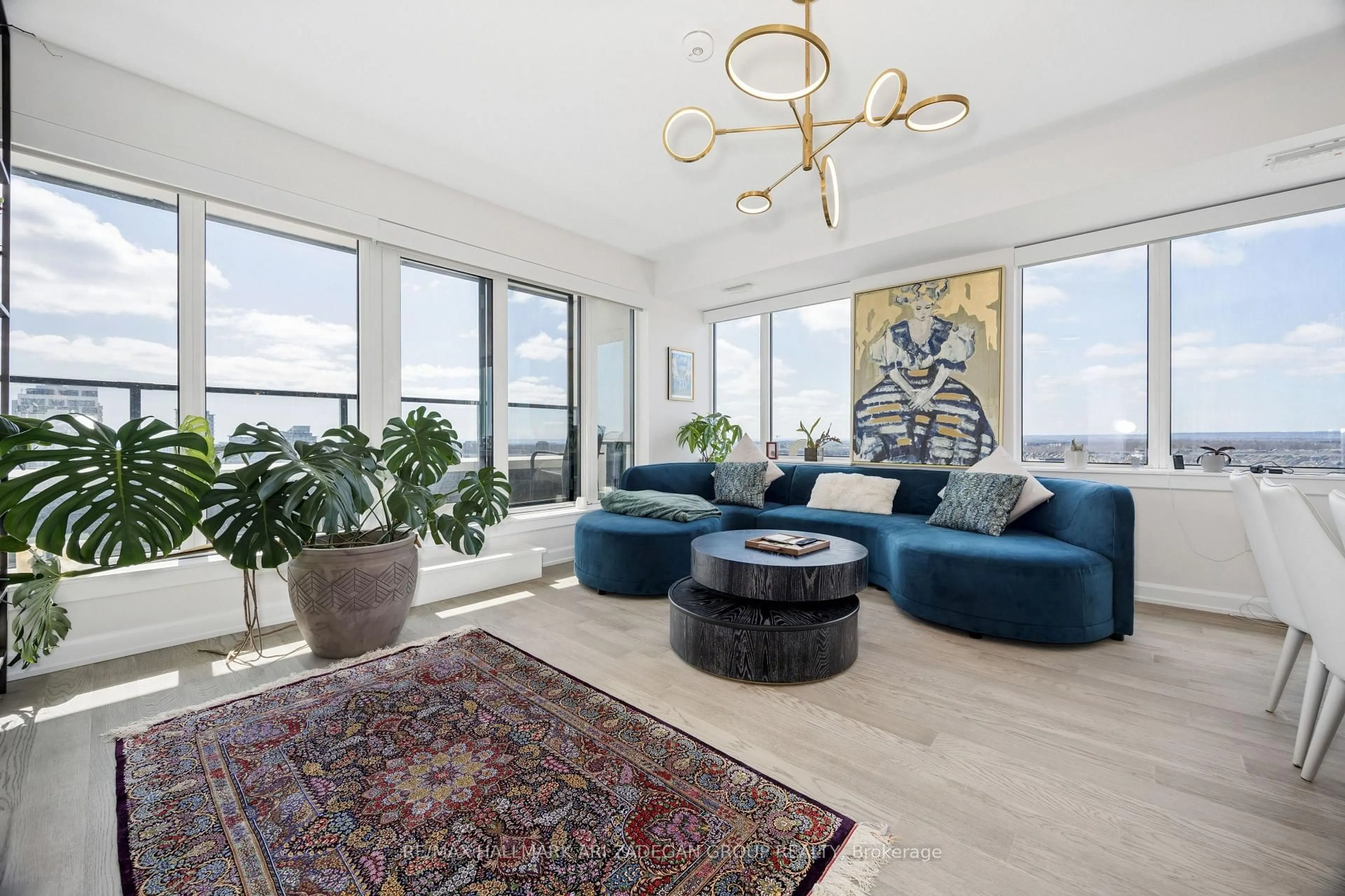 Living room with furniture, unknown for 3200 William Coltson Ave #1302, Oakville Ontario L6H 7W6