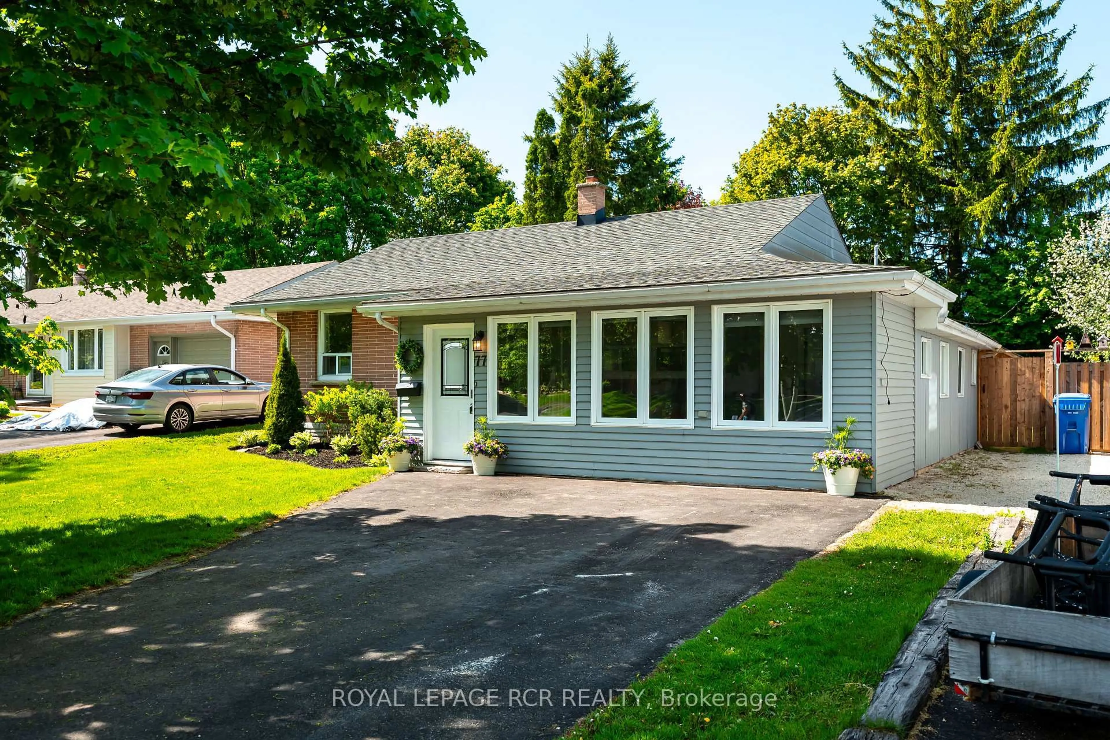 Home with vinyl exterior material, street for 77 Zina St, Orangeville Ontario L9W 1E6