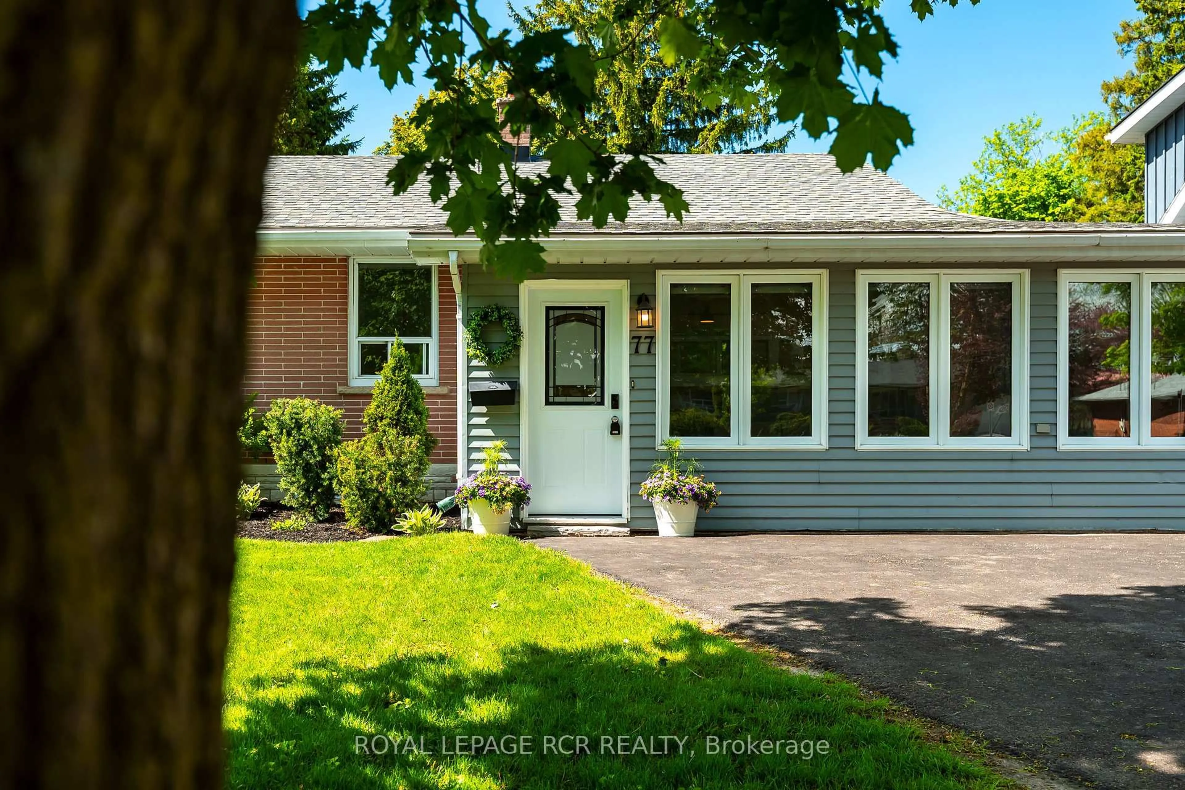 Home with vinyl exterior material, street for 77 Zina St, Orangeville Ontario L9W 1E6