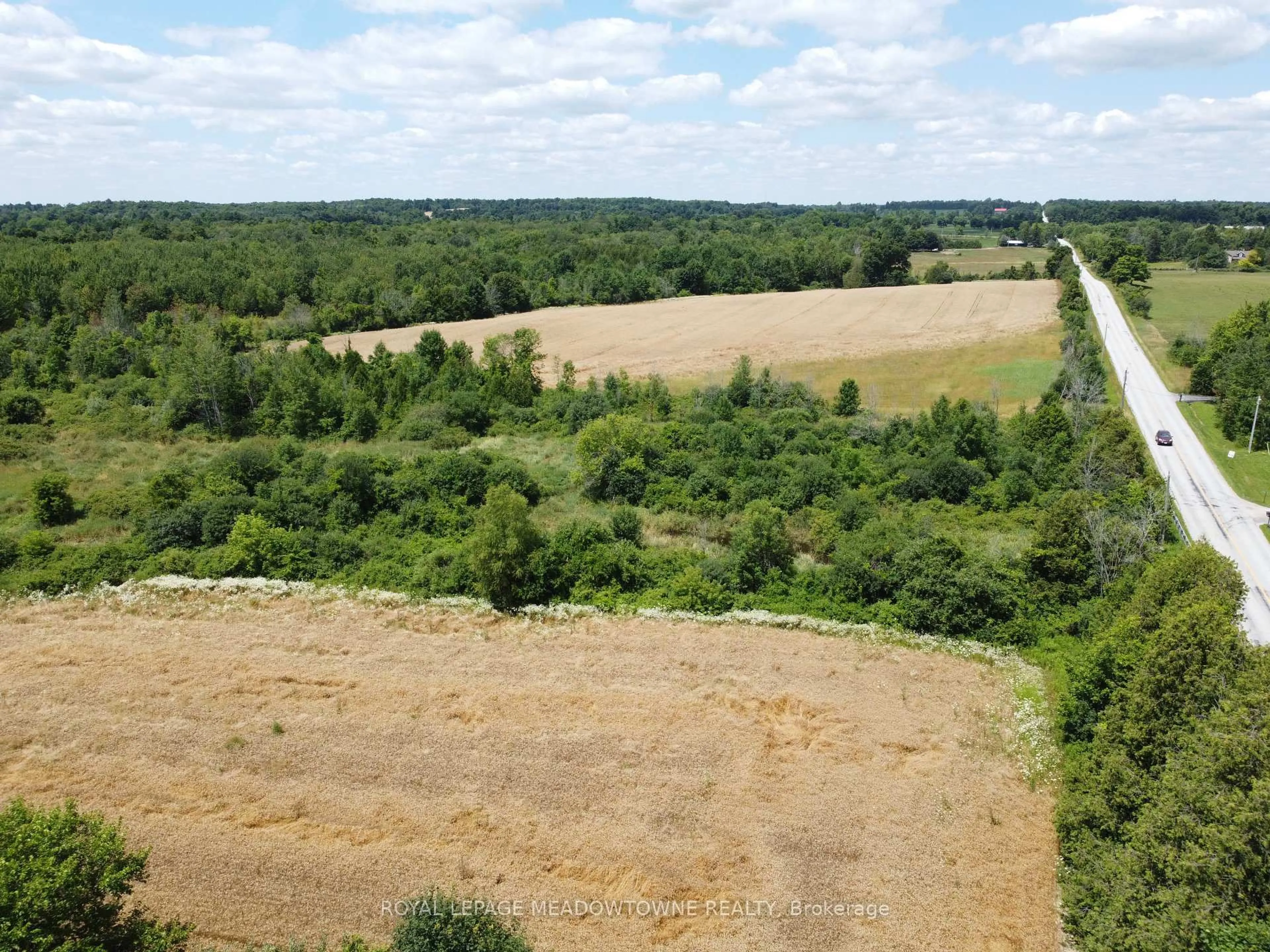 A pic from outside/outdoor area/front of a property/back of a property/a pic from drone, forest/trees view for 11080 First Line Nassagaweya, Milton Ontario L0P 1J0