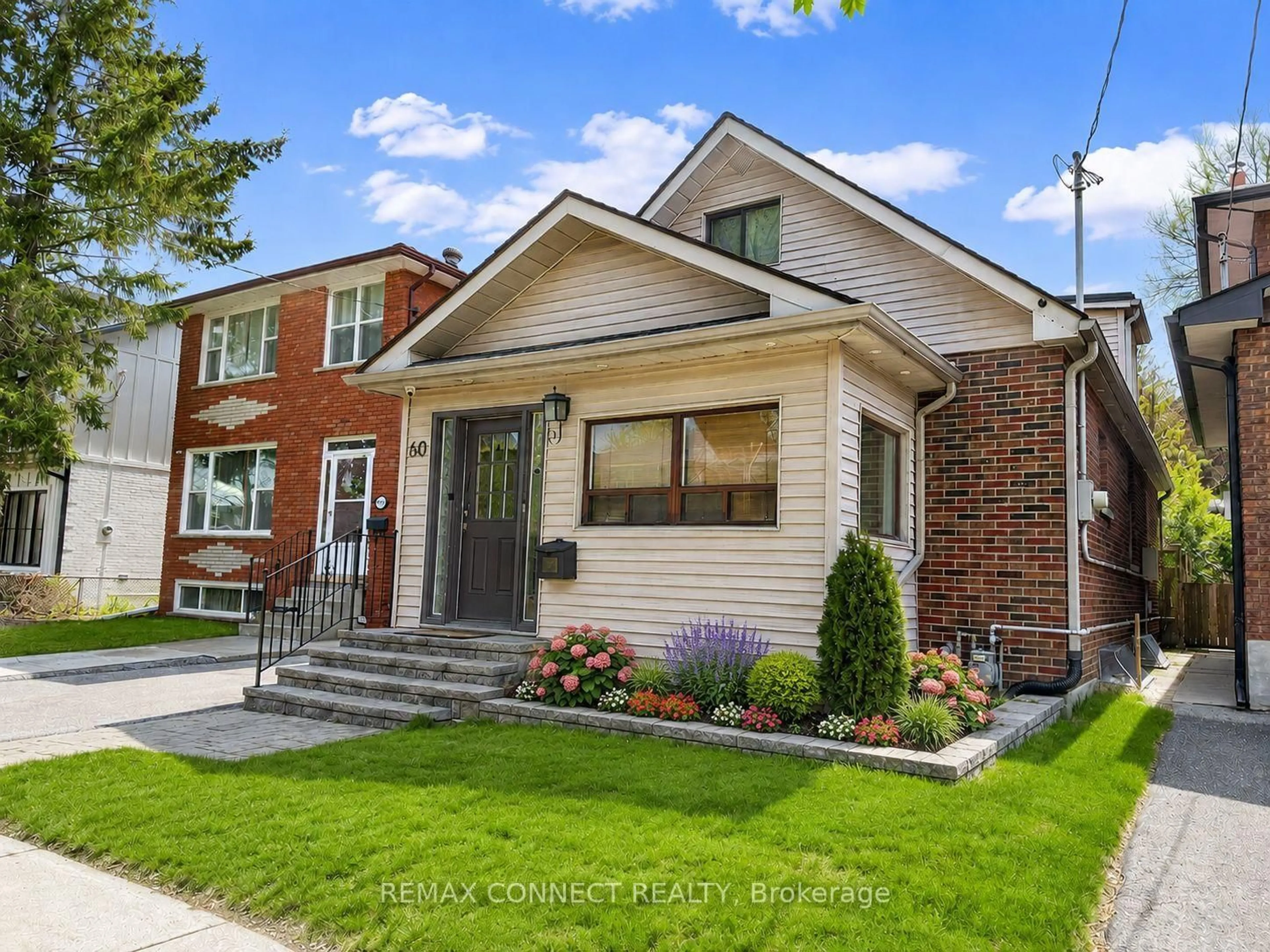 Home with brick exterior material, street for 60 Woodbury Rd, Toronto Ontario M8W 1X7