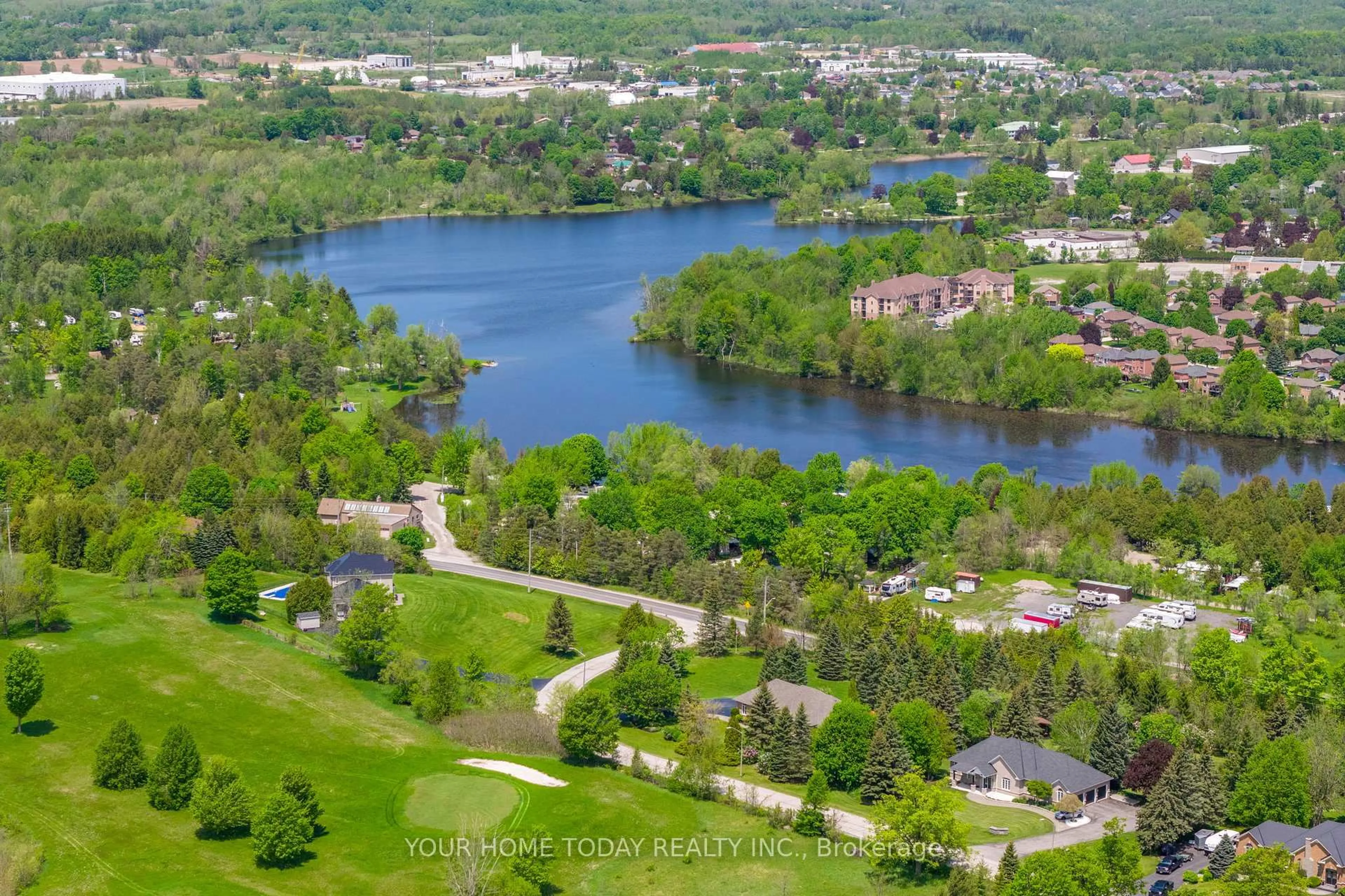 A pic from outside/outdoor area/front of a property/back of a property/a pic from drone, water/lake/river/ocean view for 2 Trillium Terr, Halton Hills Ontario L7J 2W8