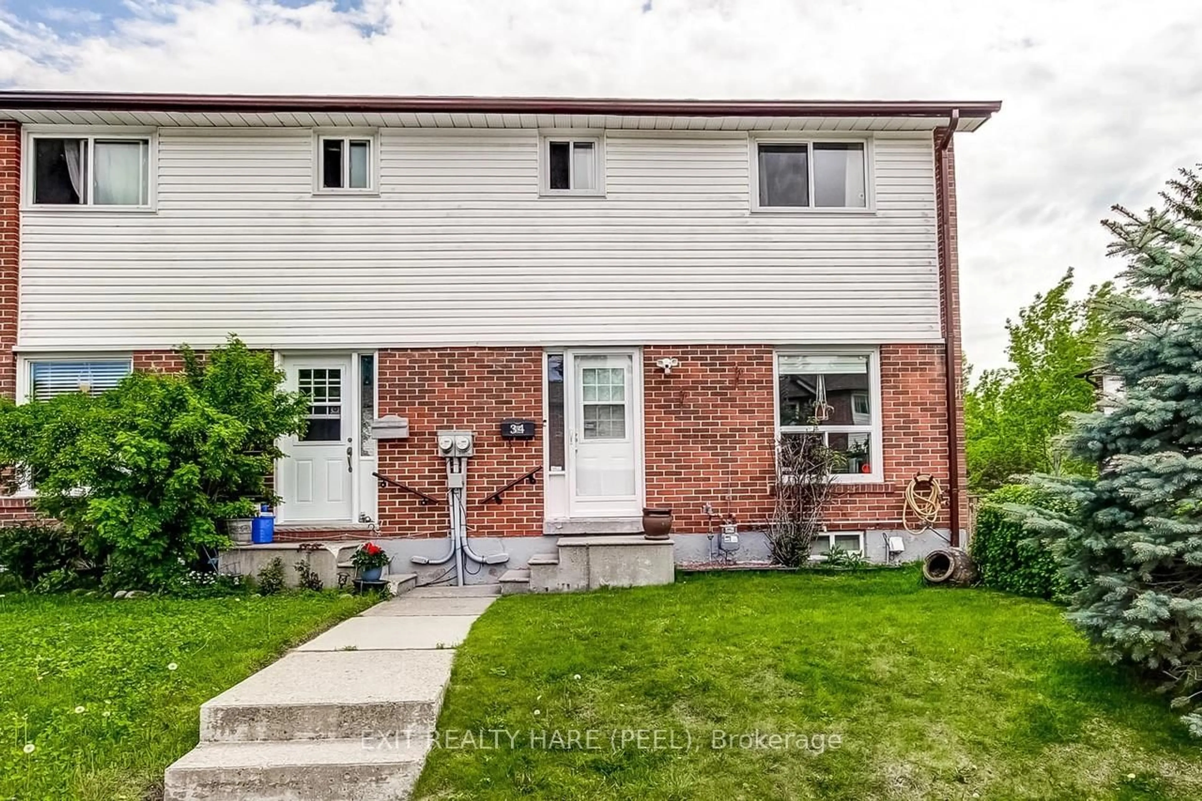 Home with brick exterior material, street for 34 Kingham Rd, Halton Hills Ontario L7J 1S4