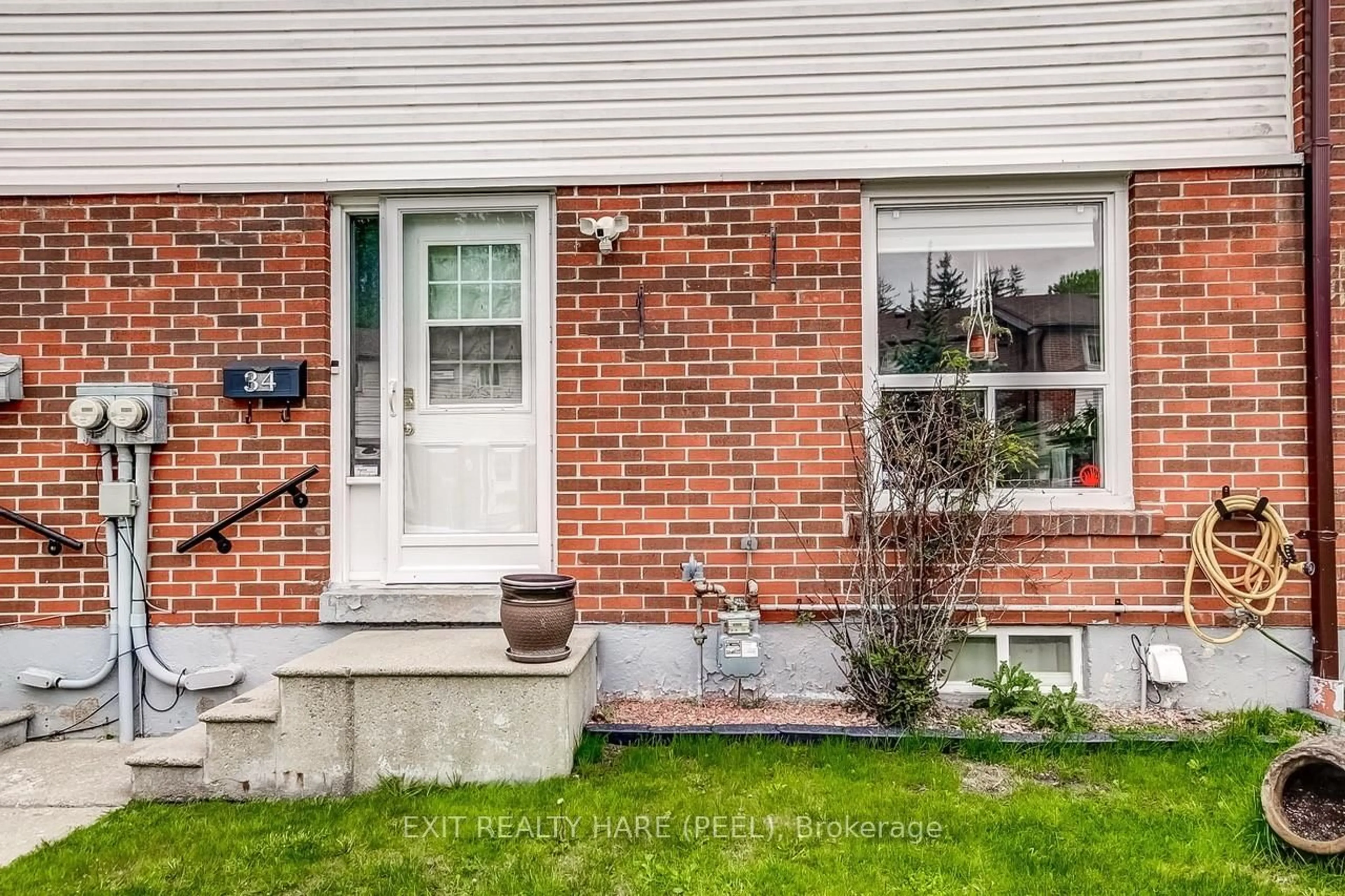 Home with brick exterior material, street for 34 Kingham Rd, Halton Hills Ontario L7J 1S4