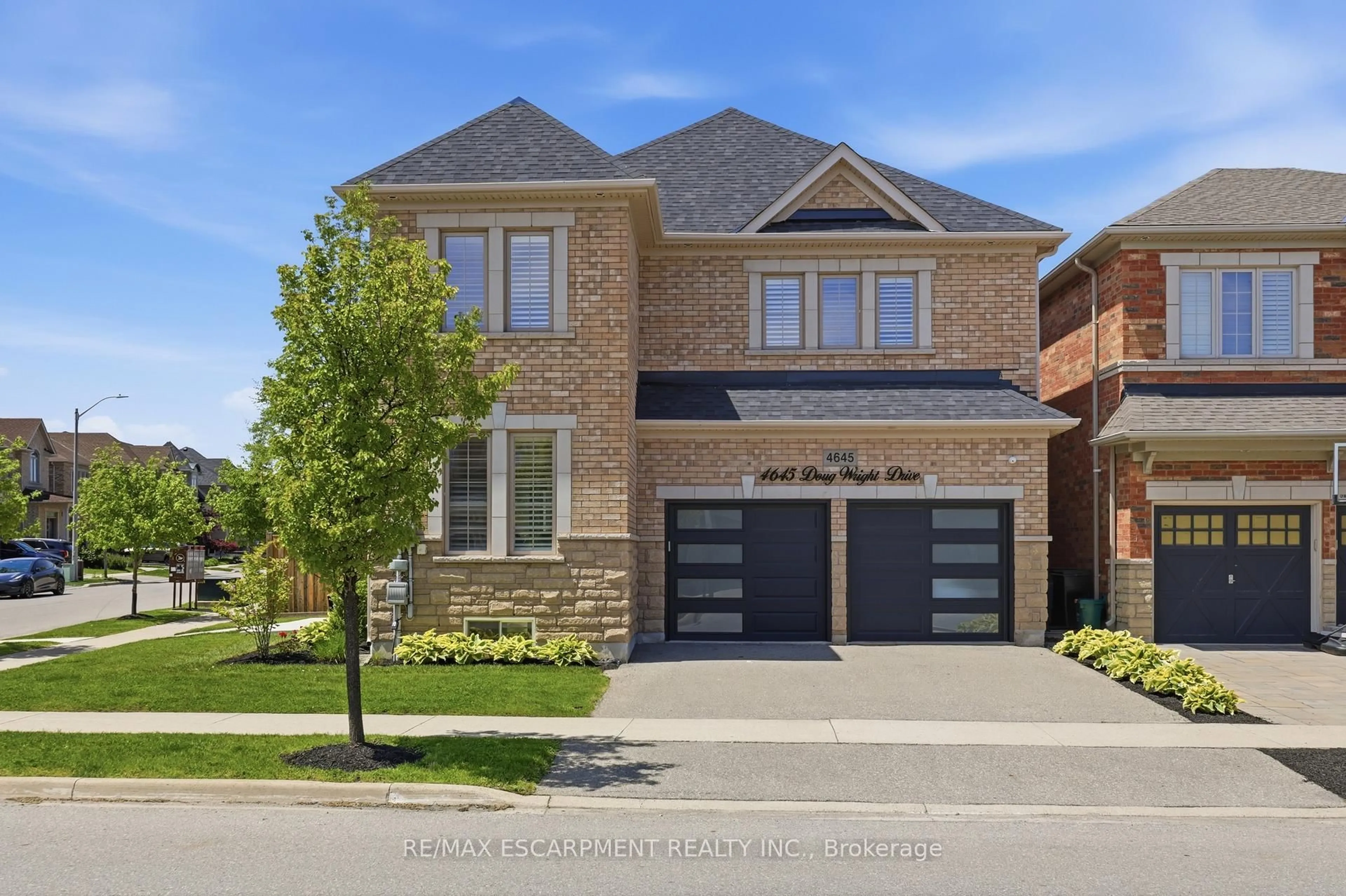 Home with brick exterior material, street for 4645 Doug Wright Dr, Burlington Ontario L7M 0L3
