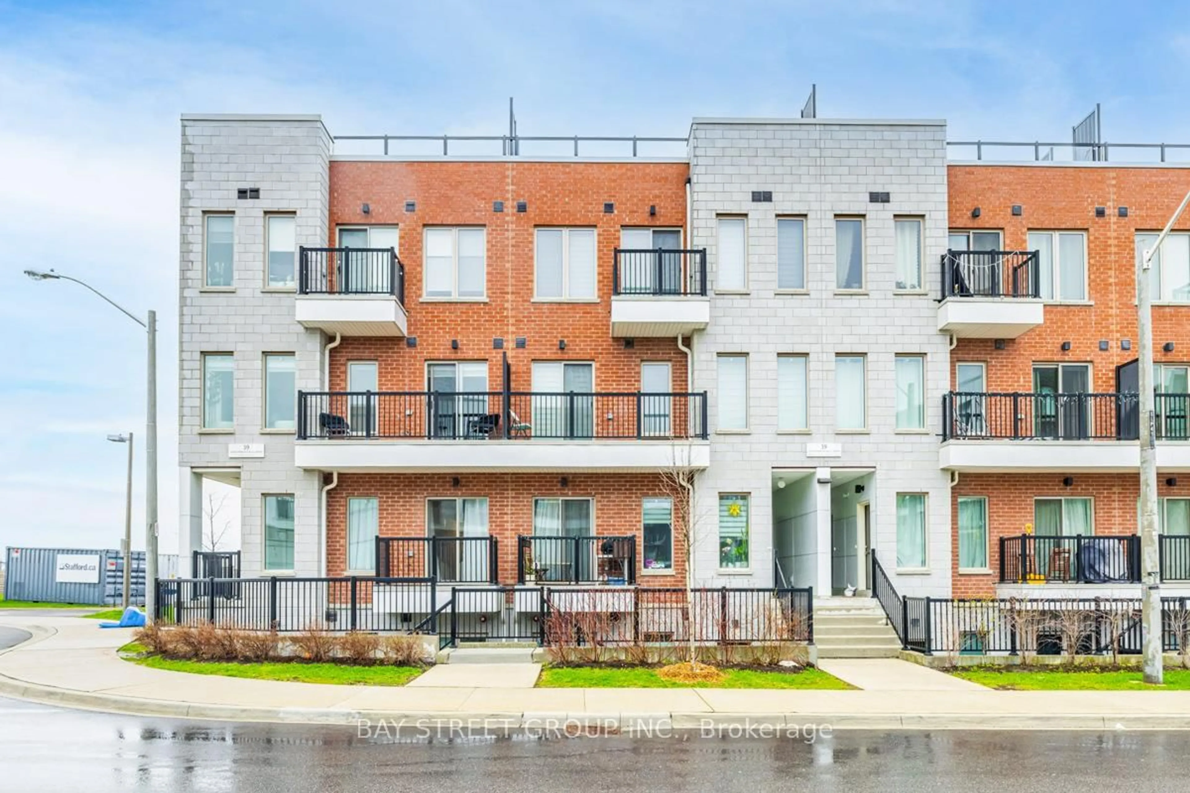 Home with brick exterior material, street for 39 John Perkins Bull Dr #6, Toronto Ontario M3K 0C3