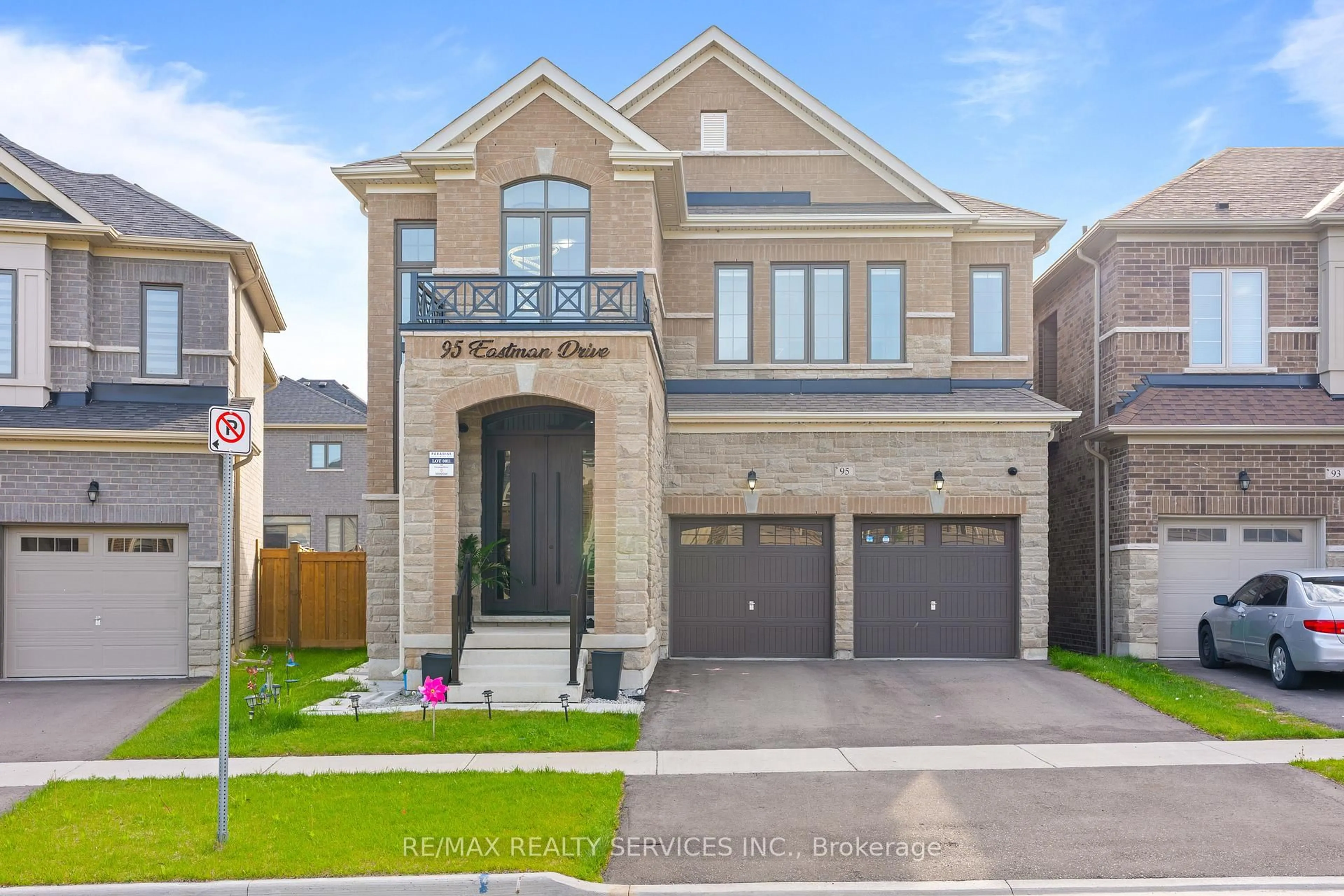 Home with brick exterior material, street for 95 Eastman Dr, Brampton Ontario L6X 5S5