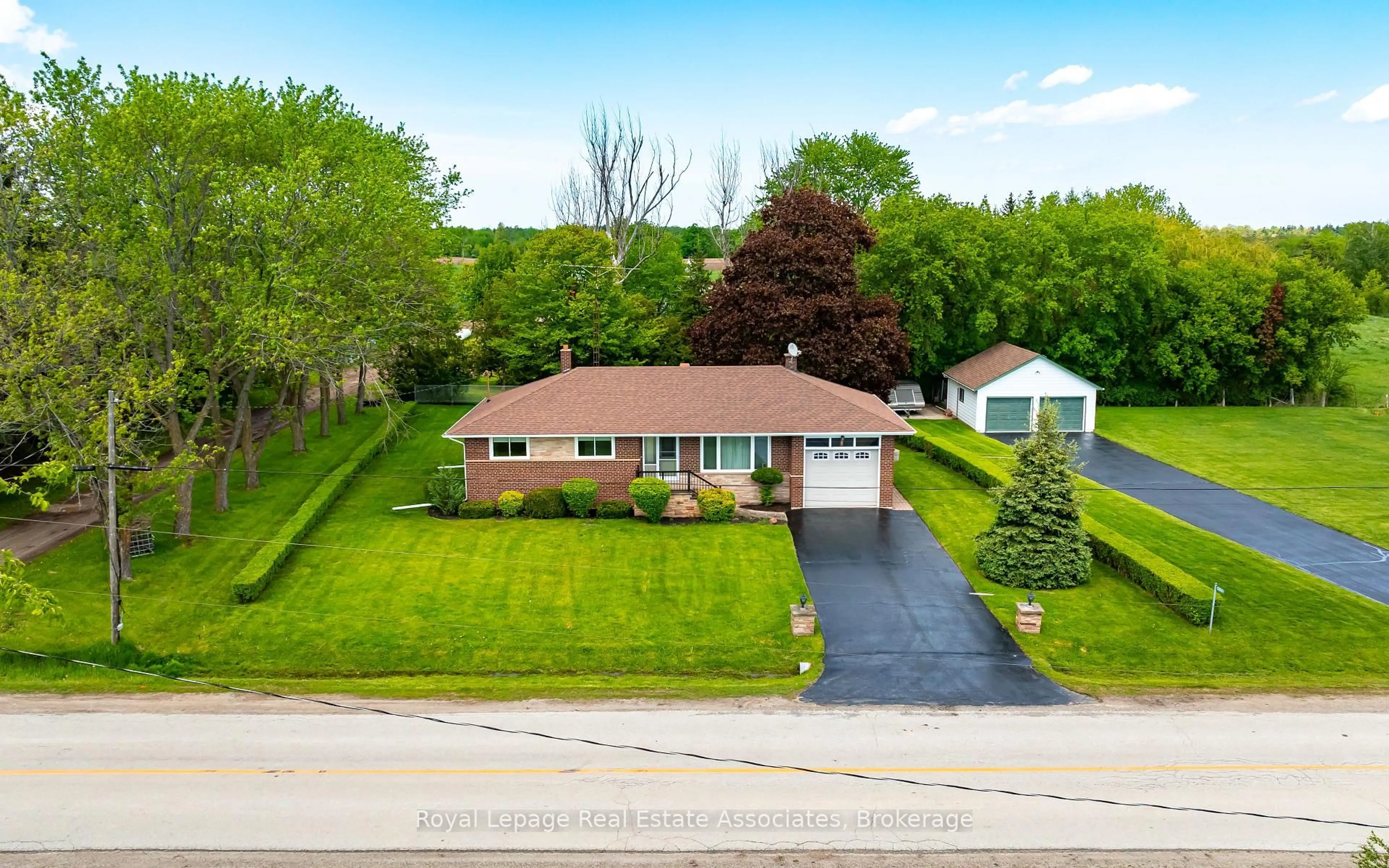 A pic from outside/outdoor area/front of a property/back of a property/a pic from drone, street for 12851 9 Line, Halton Hills Ontario L7G 4S8