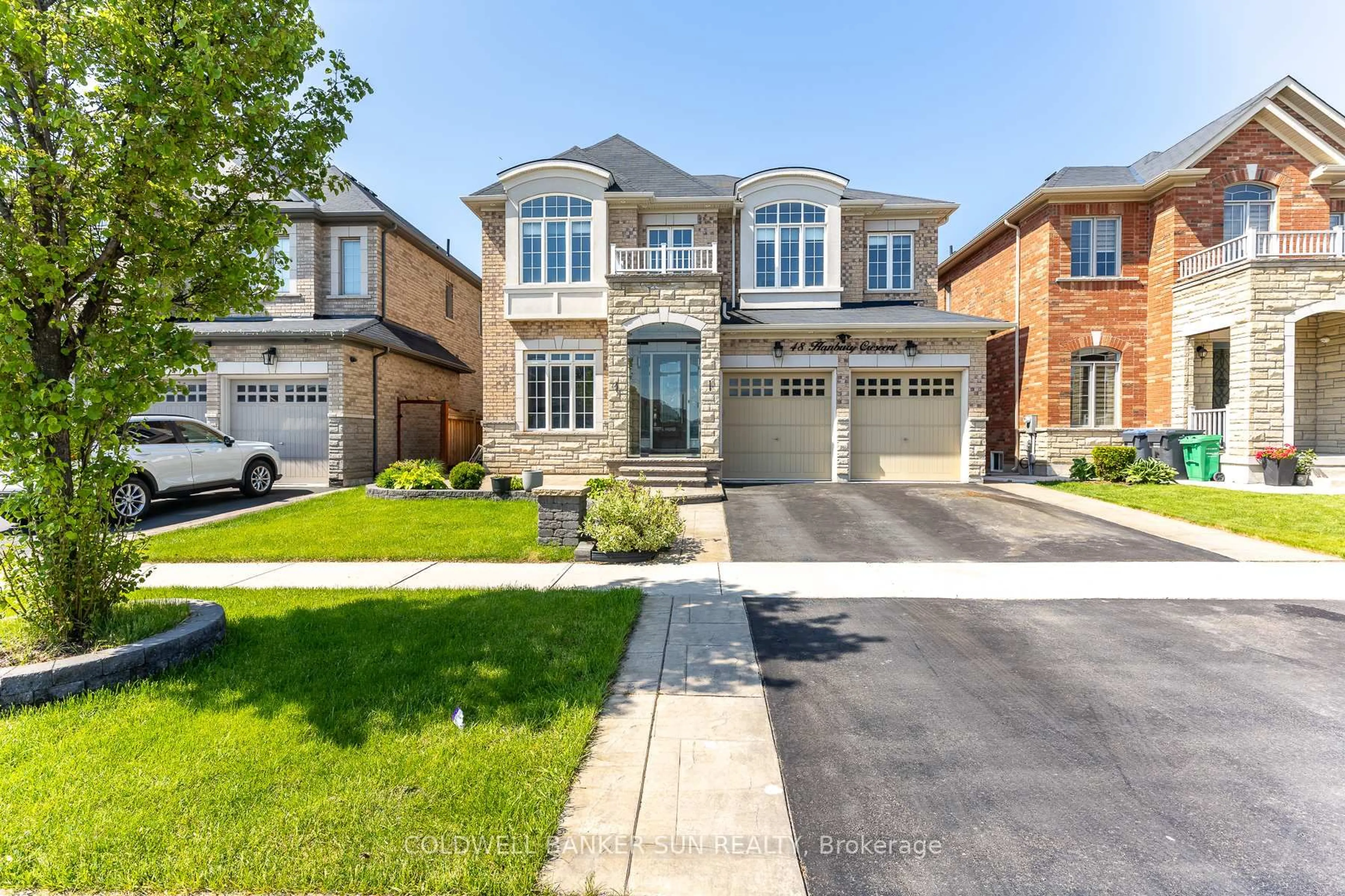 Home with brick exterior material, street for 48 Hanbury Cres, Brampton Ontario L6X 5N7
