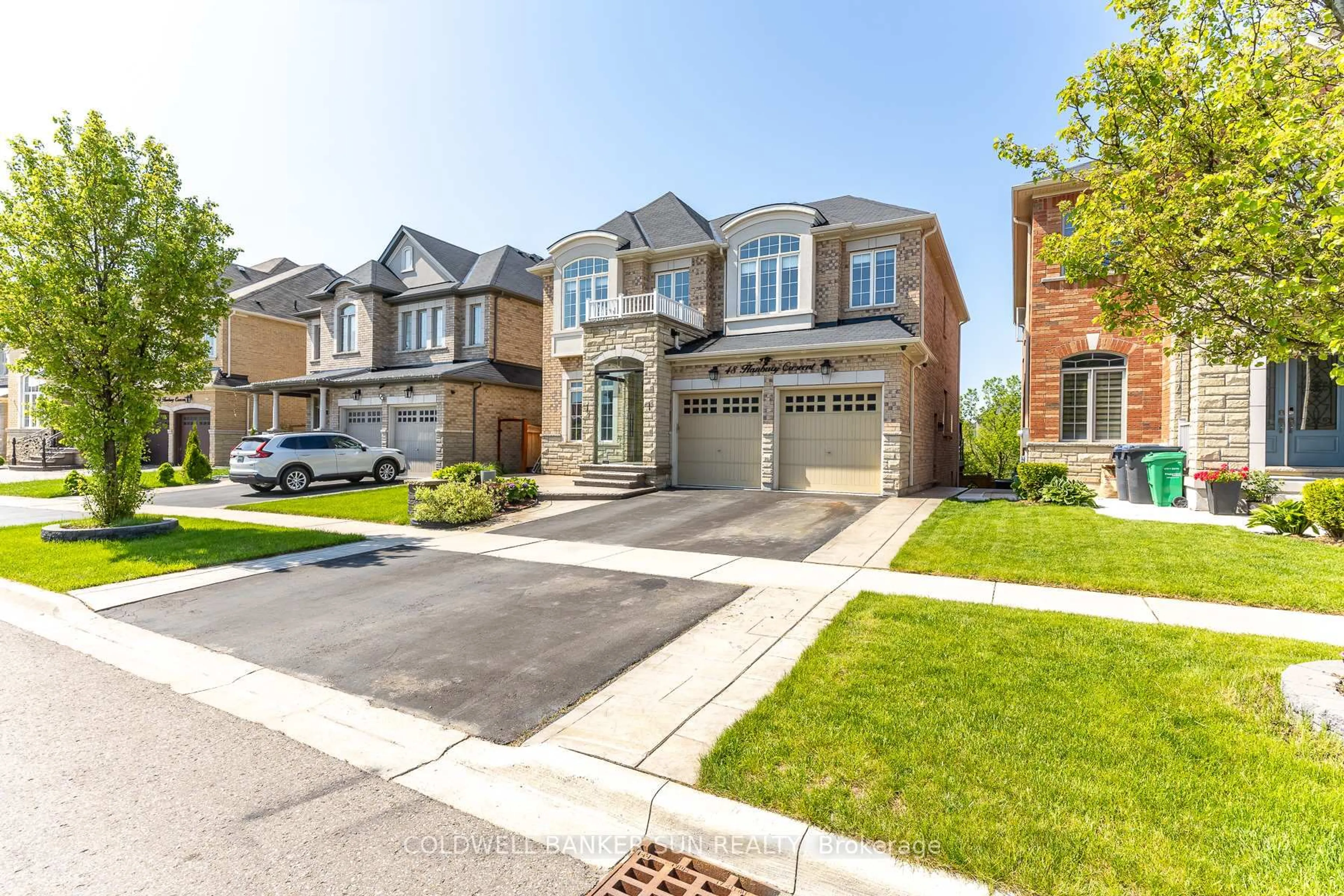 Home with brick exterior material, street for 48 Hanbury Cres, Brampton Ontario L6X 5N7