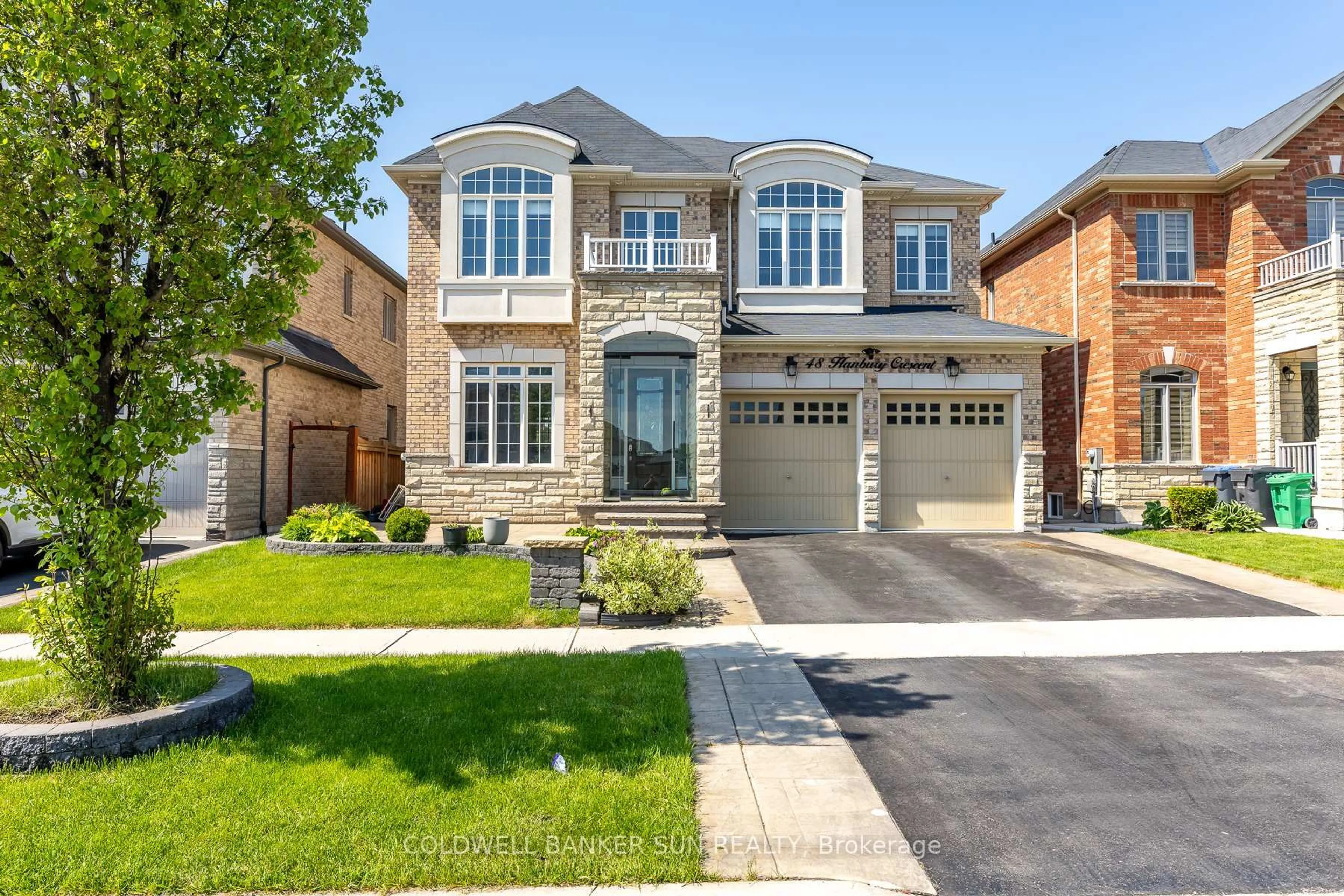 Home with brick exterior material, street for 48 Hanbury Cres, Brampton Ontario L6X 5N7