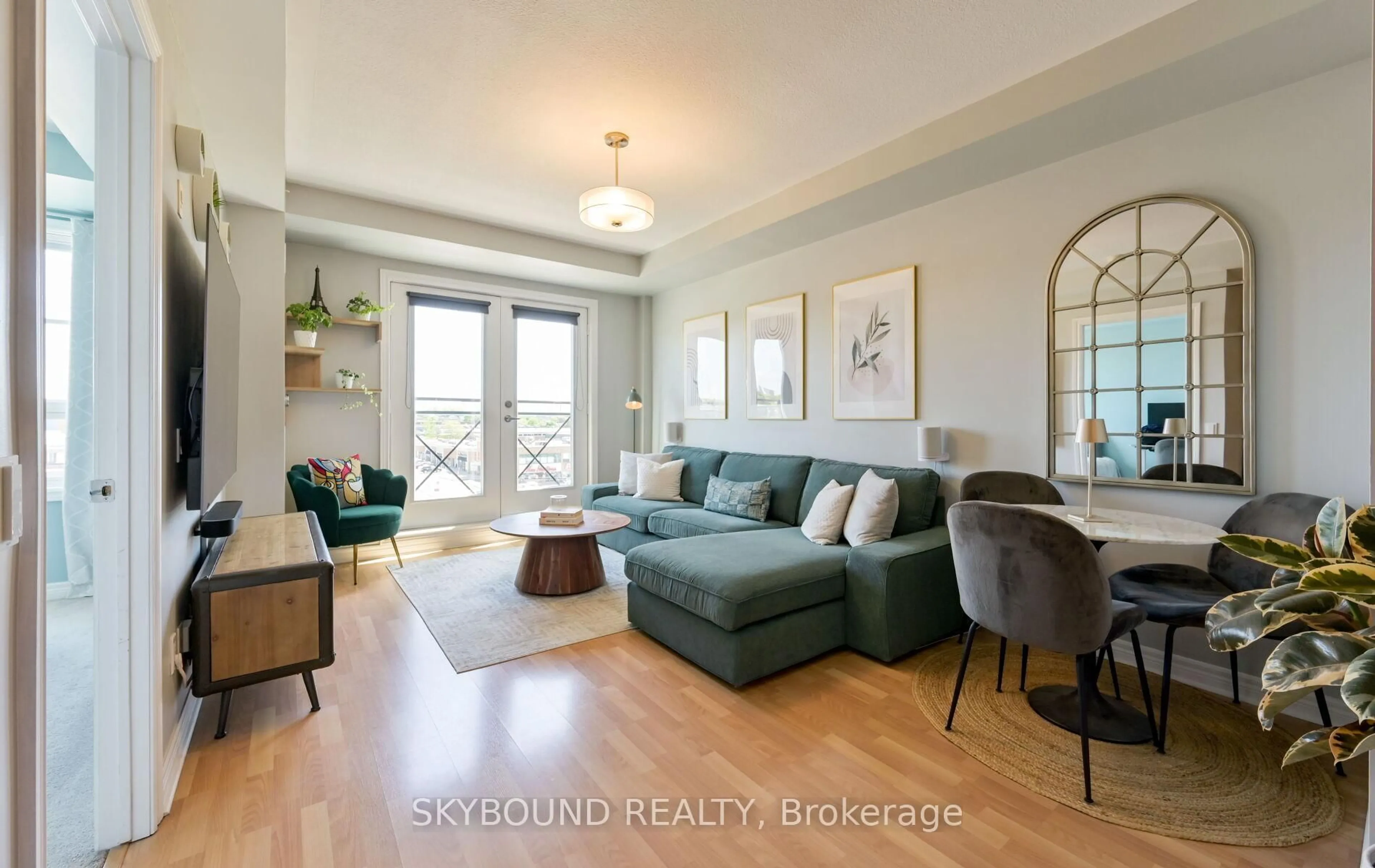 Living room with furniture, wood/laminate floor for 1415 Lawrence Ave #516, Toronto Ontario M6L 1A9