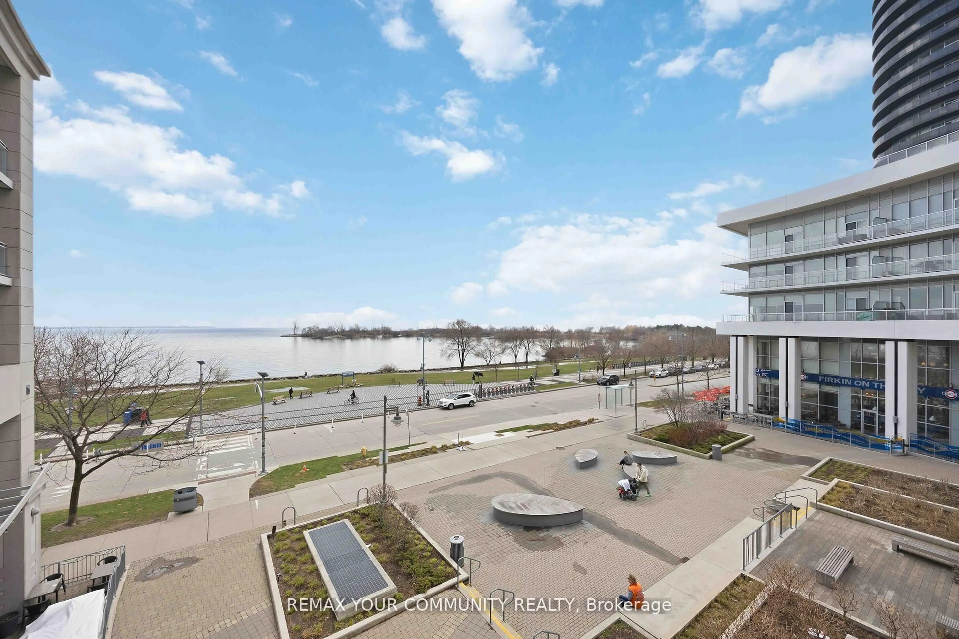 A pic from outside/outdoor area/front of a property/back of a property/a pic from drone, water/lake/river/ocean view for 58 Marine Parade Dr #215, Toronto Ontario M8V 4G1