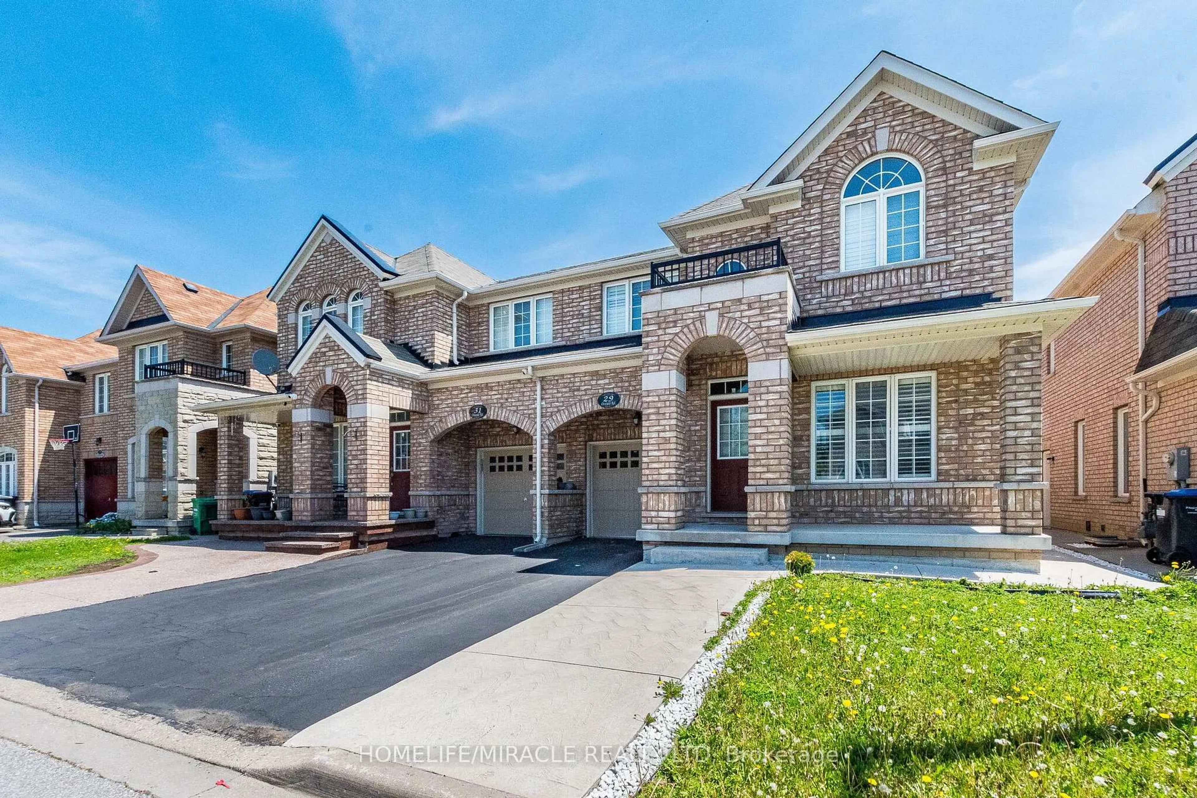 Home with brick exterior material, street for 29 Oswald Rd, Brampton Ontario L6P 3S4