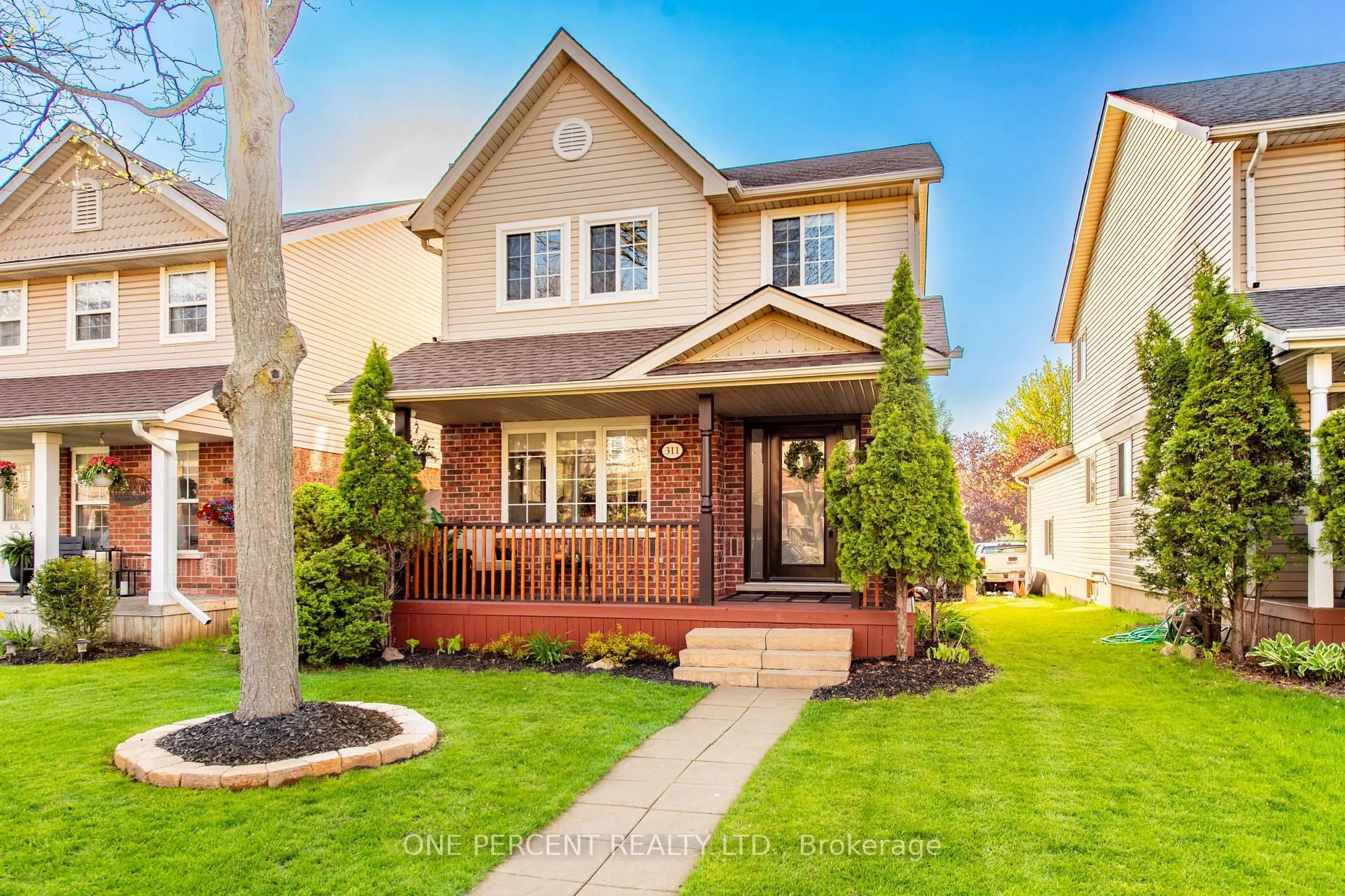 Home with brick exterior material, street for 311 Fern St, Orangeville Ontario L9W 5B8