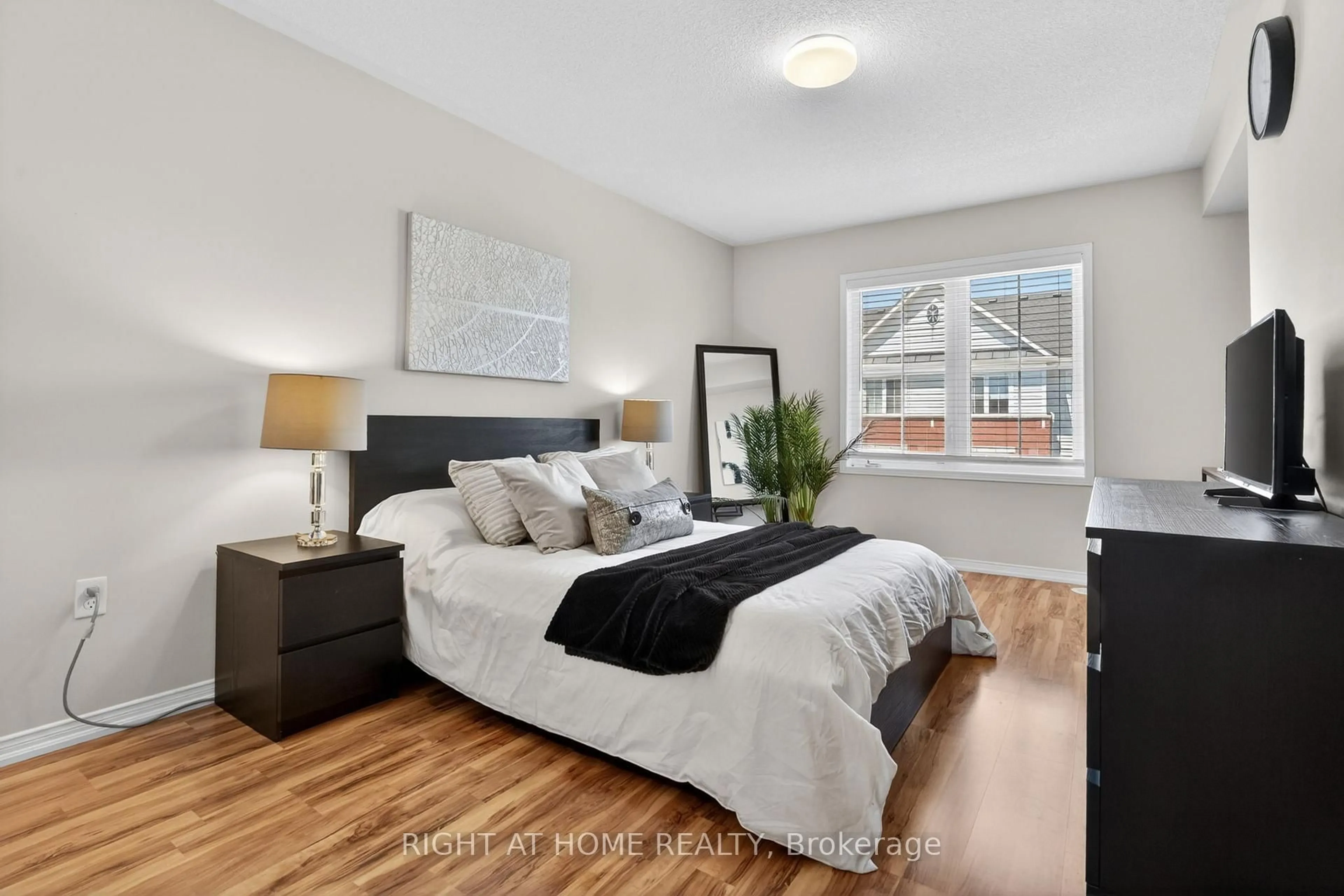 Bedroom with bed, wood/laminate floor for 2480 Post Rd #26, Oakville Ontario L0R 2H0
