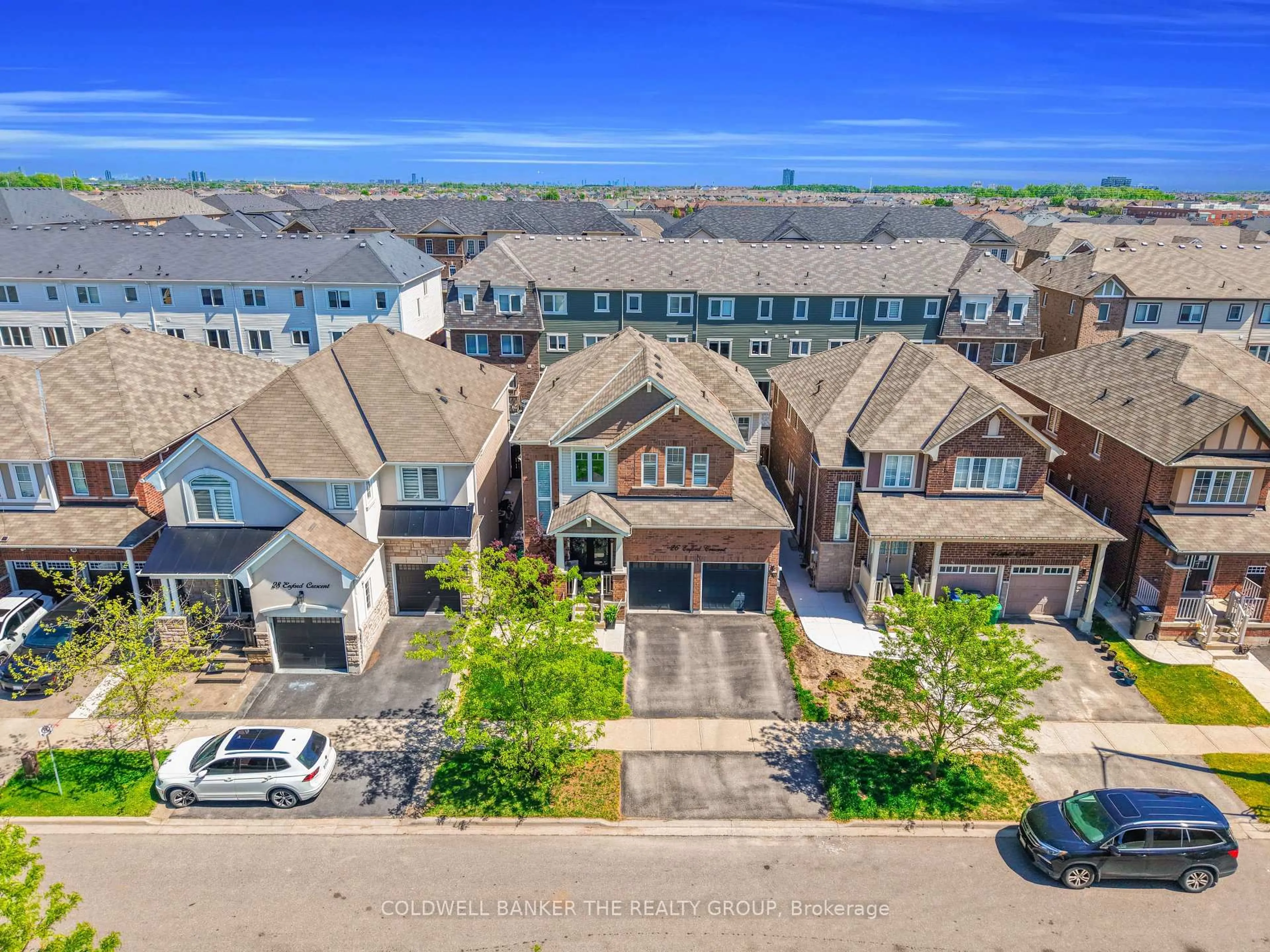 A pic from outside/outdoor area/front of a property/back of a property/a pic from drone, unknown for 26 Enford Cres, Brampton Ontario L7A 4E8