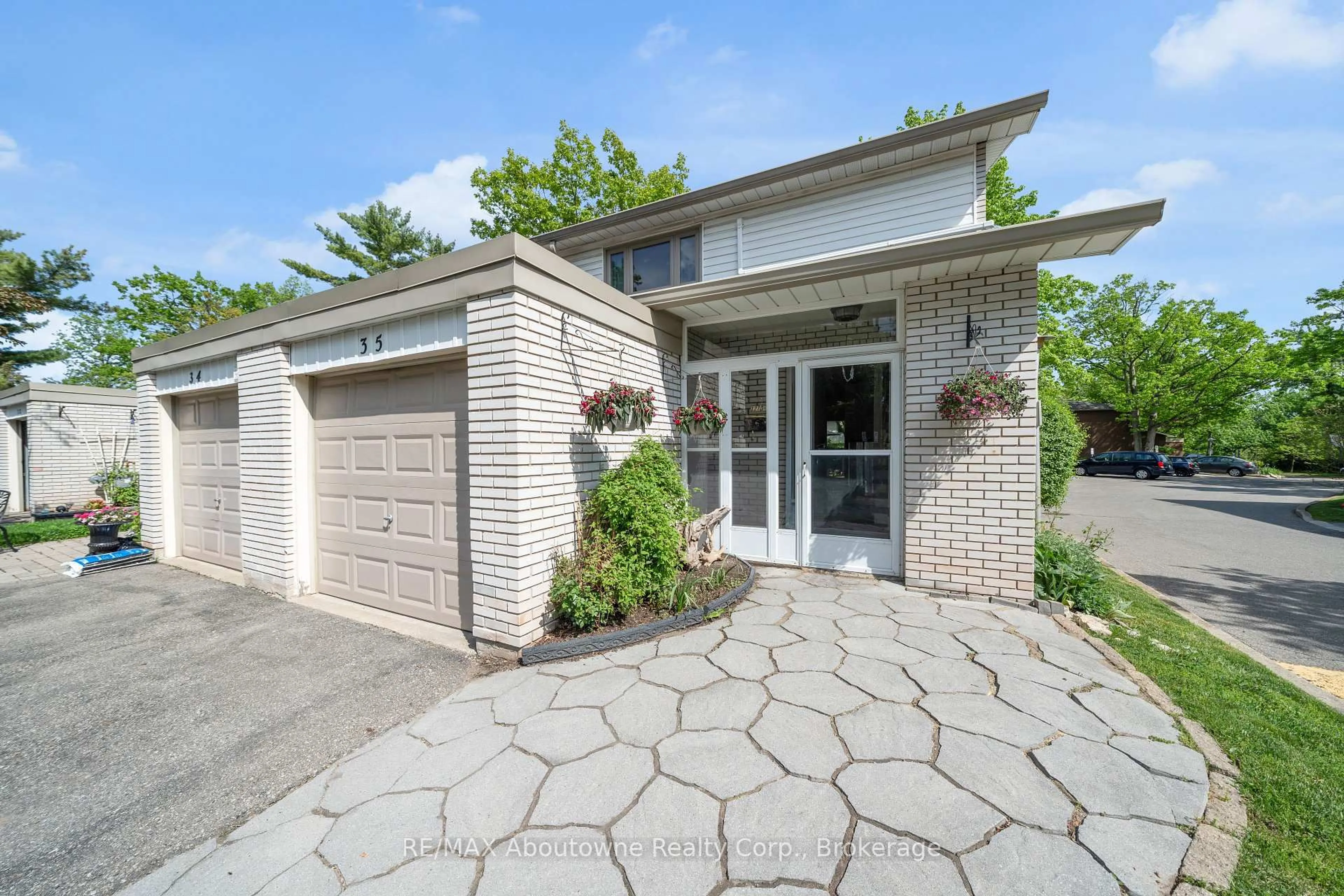 Home with brick exterior material, street for 1270 Gainsborough Dr #35, Oakville Ontario M9A 0E1