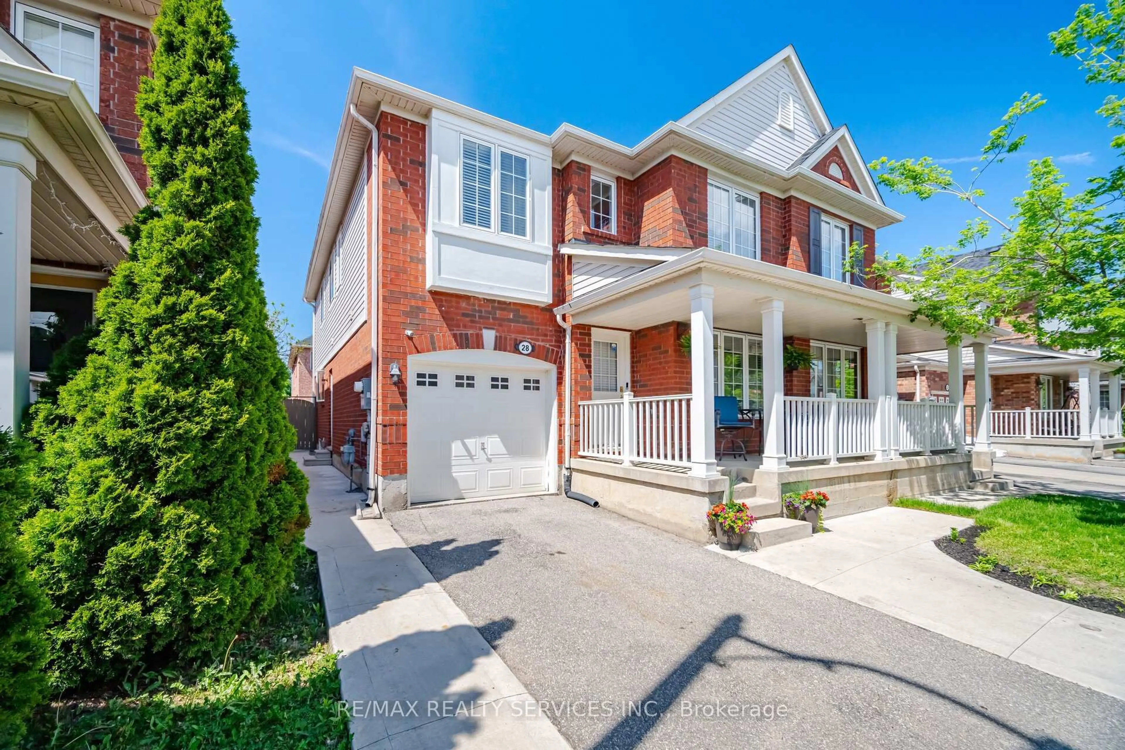Home with brick exterior material, street for 28 Ponymeadow Way, Brampton Ontario L6X 0M3