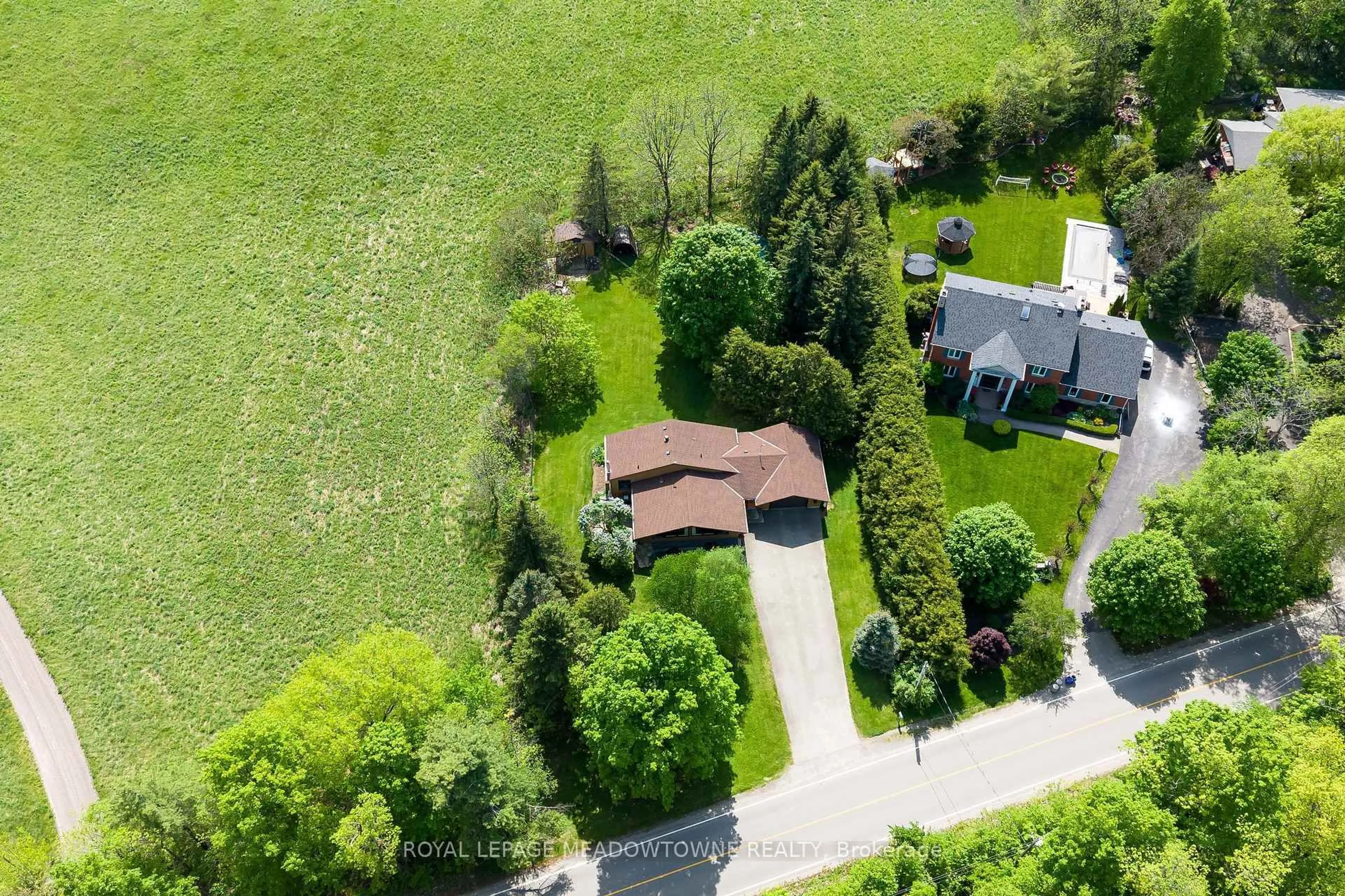 A pic from outside/outdoor area/front of a property/back of a property/a pic from drone, street for 12072 Sixth Line, Halton Hills Ontario L0P 1H0