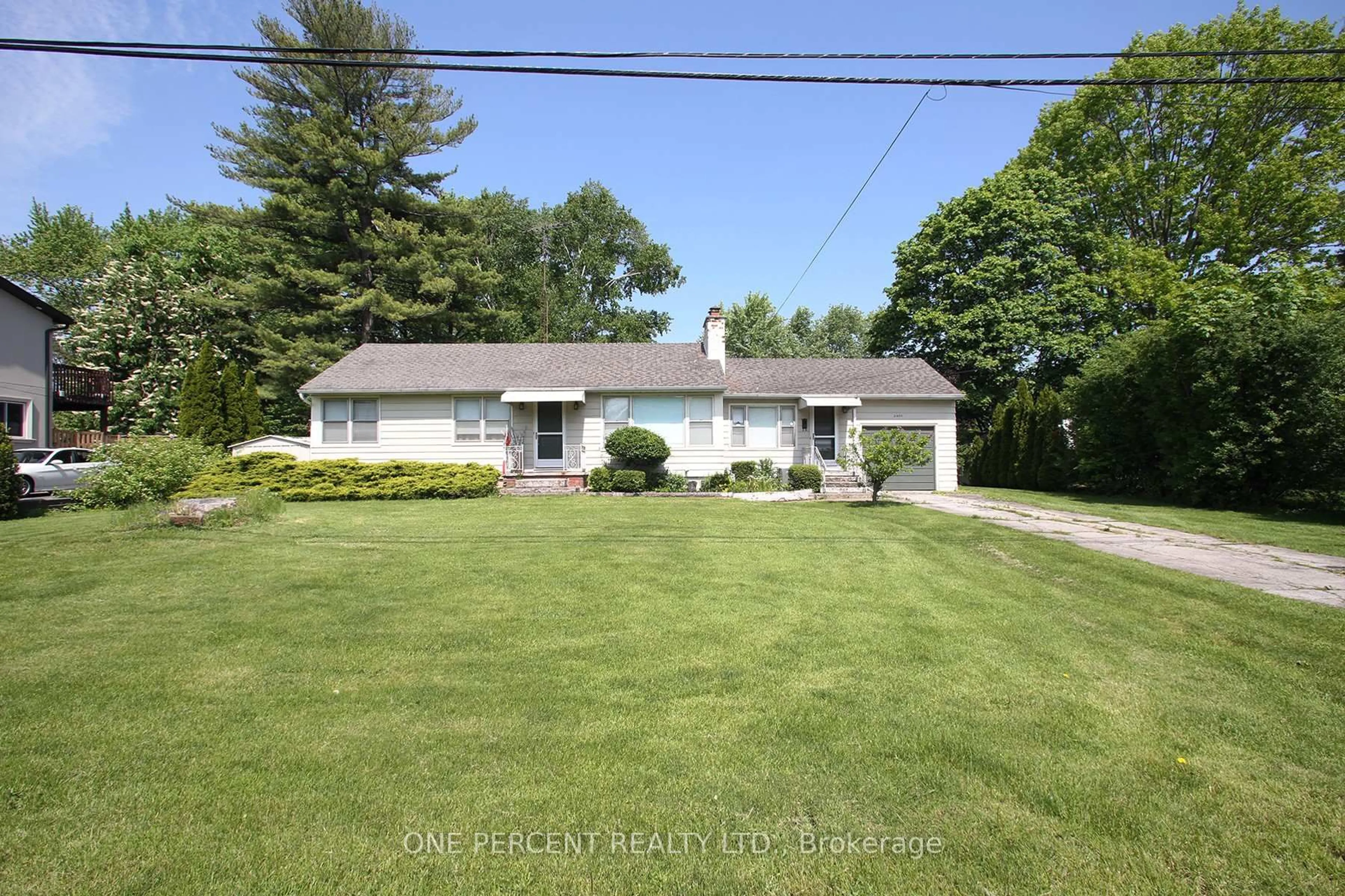 A pic from outside/outdoor area/front of a property/back of a property/a pic from drone, street for 2455 Rebecca St, Oakville Ontario L6L 2B1