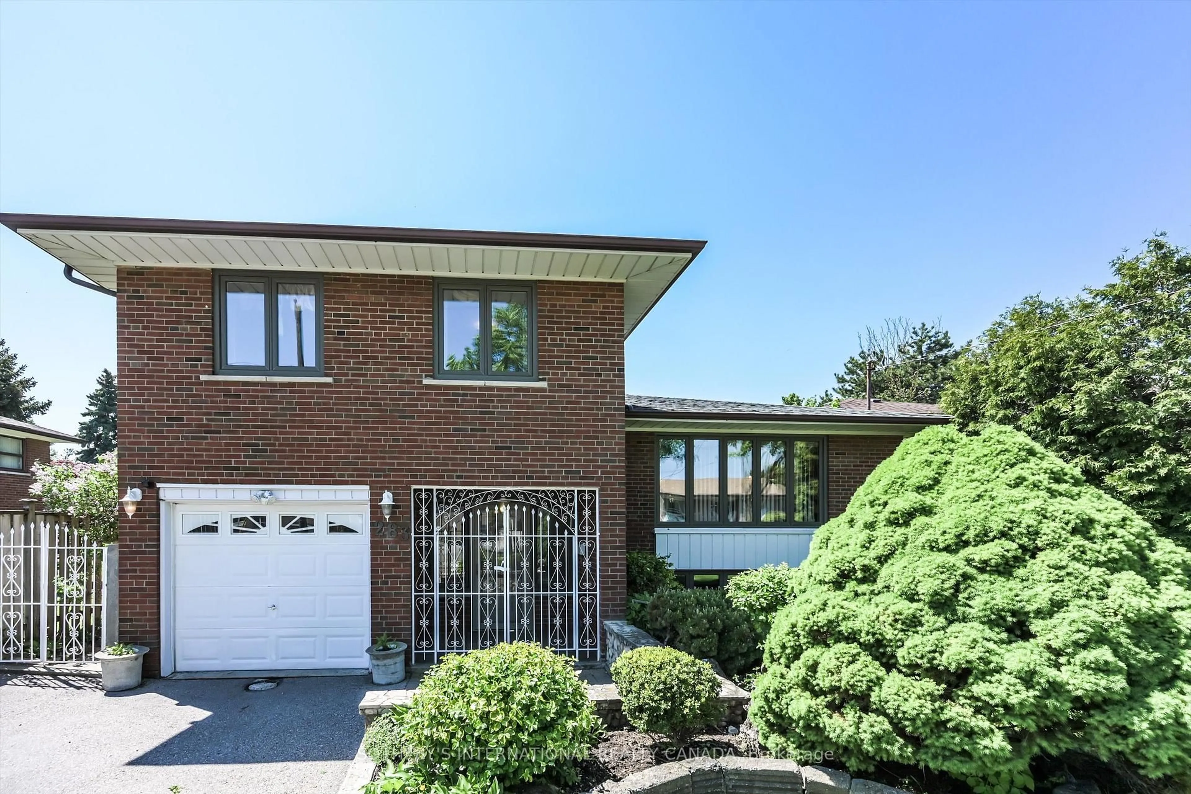 Home with brick exterior material, street for 283 Derrydown Rd, Toronto Ontario M3J 1S2