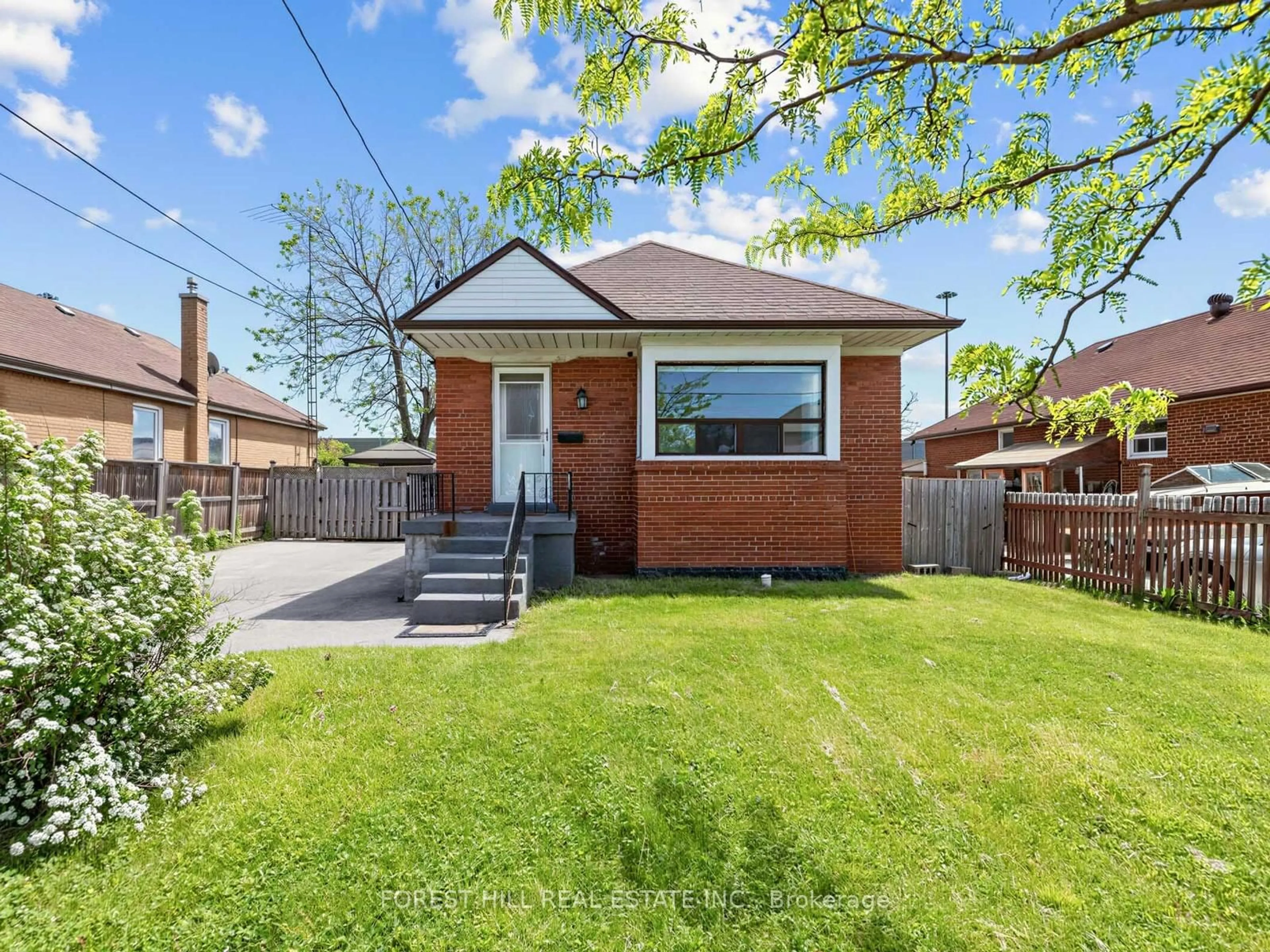 Home with brick exterior material, street for 101 Whitley Ave, Toronto Ontario M3K 1A1