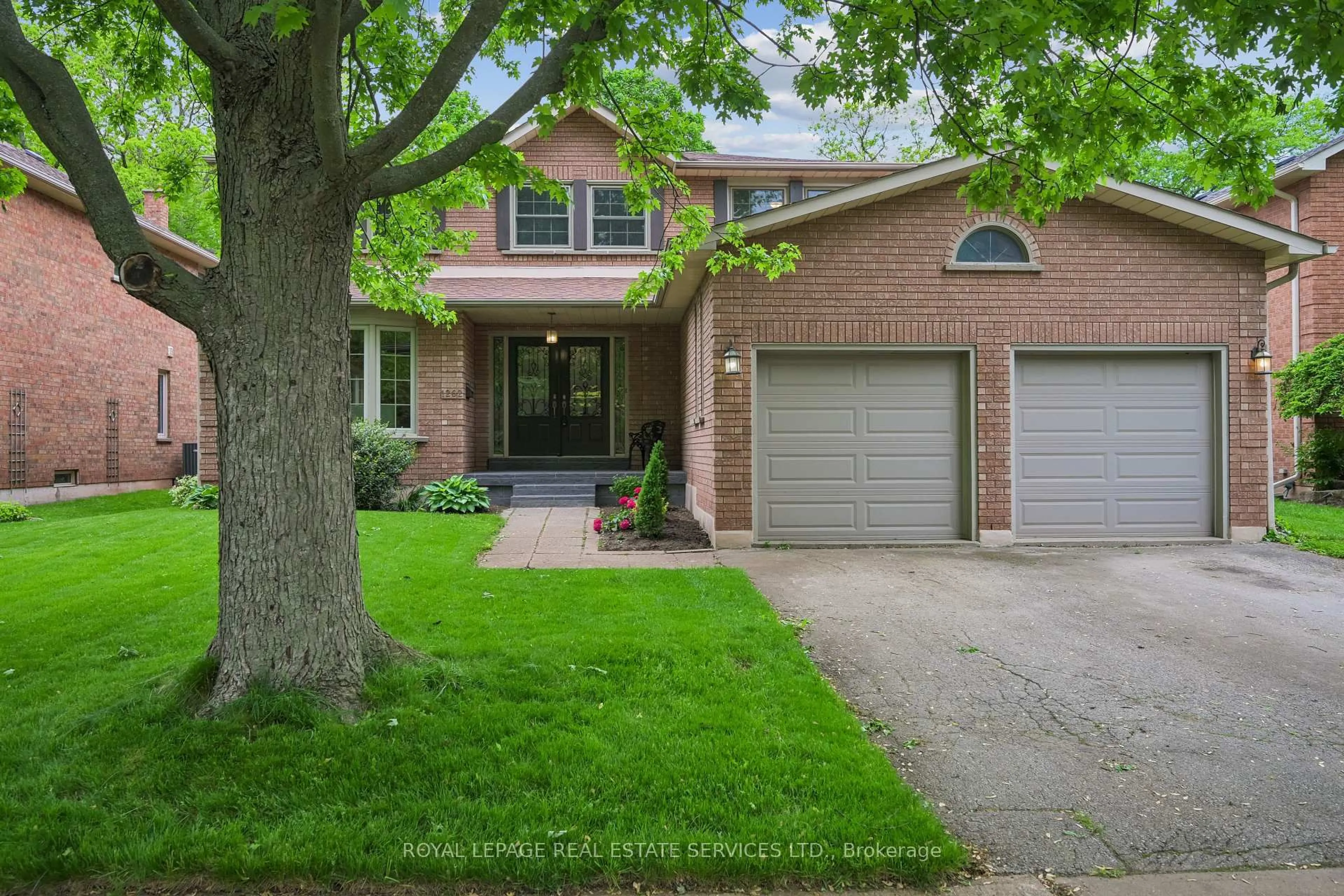 Home with brick exterior material, street for 1262 Old Colony Rd, Oakville Ontario L6M 1J8