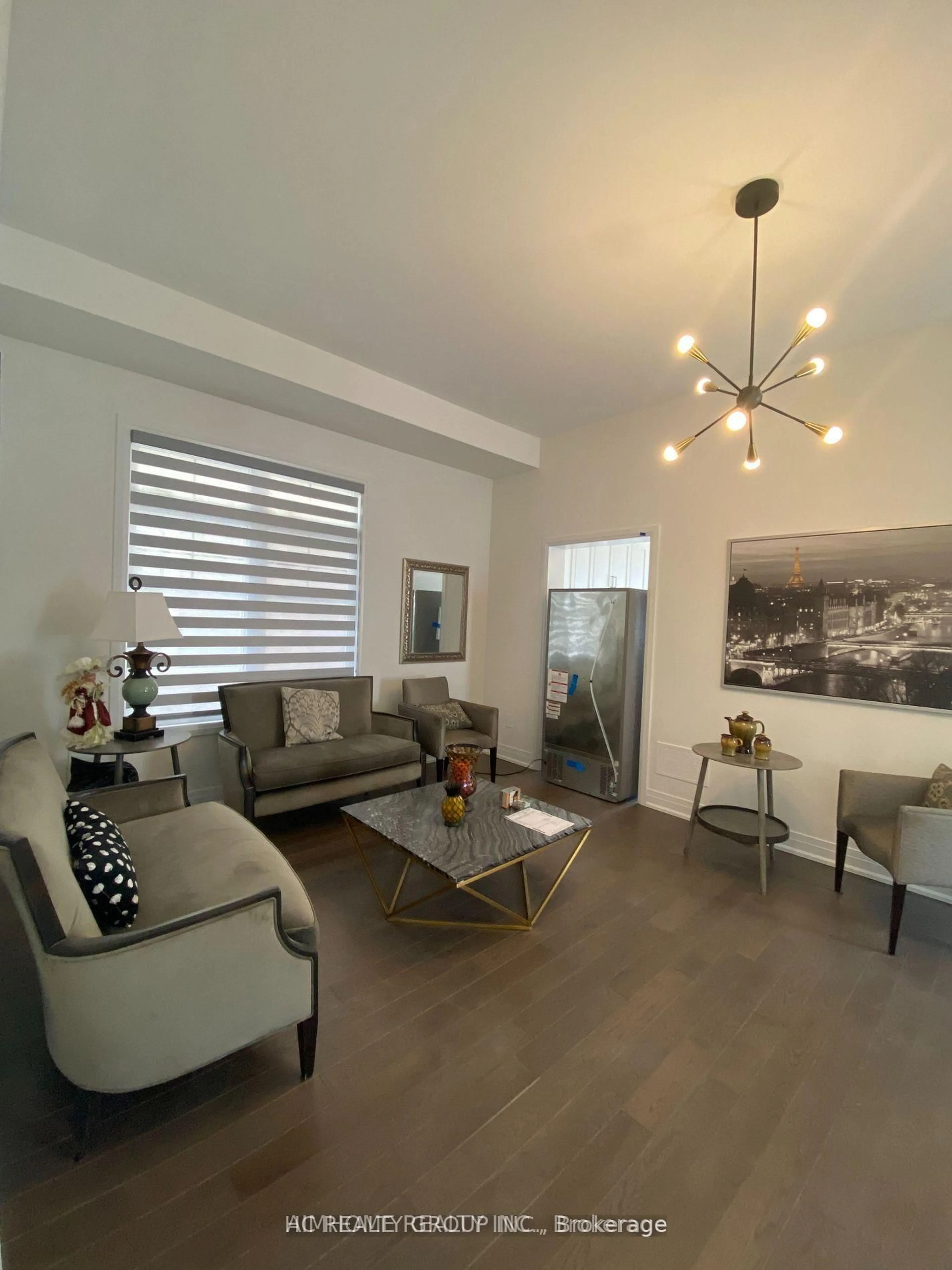 Living room with furniture, wood/laminate floor for 2130 Royal Gala Circ, Mississauga Ontario L4Y 1Z2