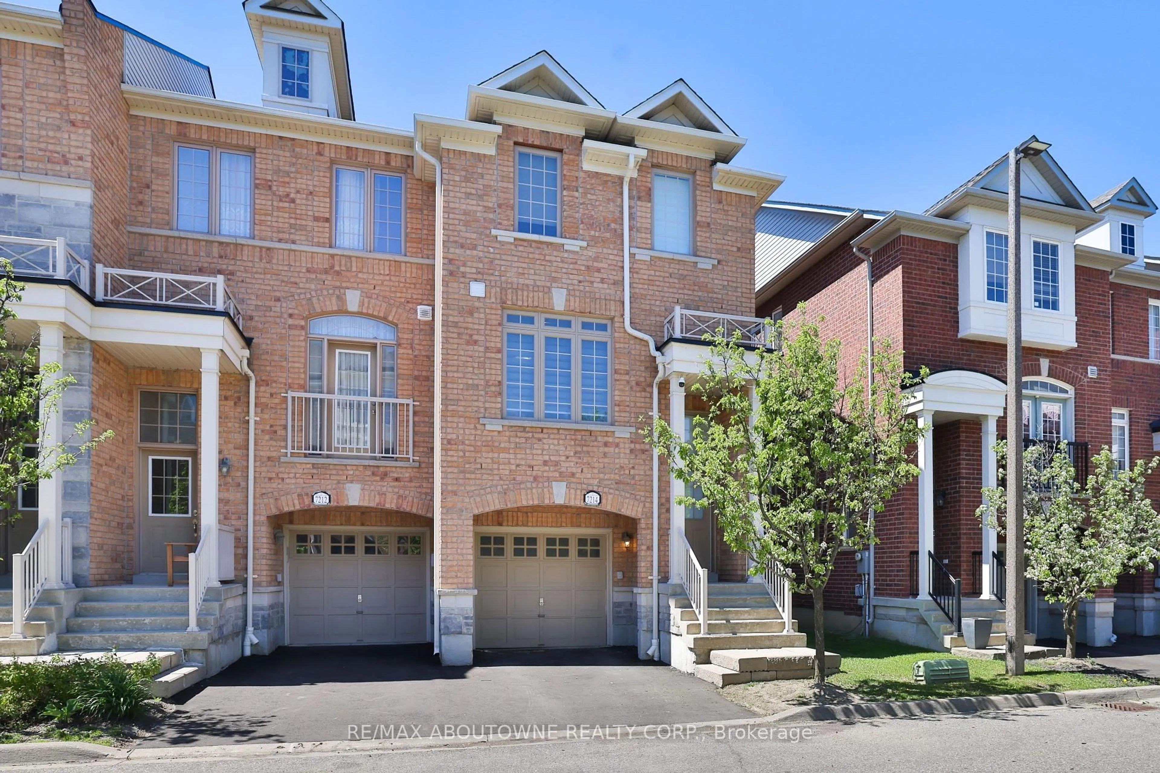 Home with brick exterior material, street for 7214 Triumph Lane, Mississauga Ontario L5N 0C5