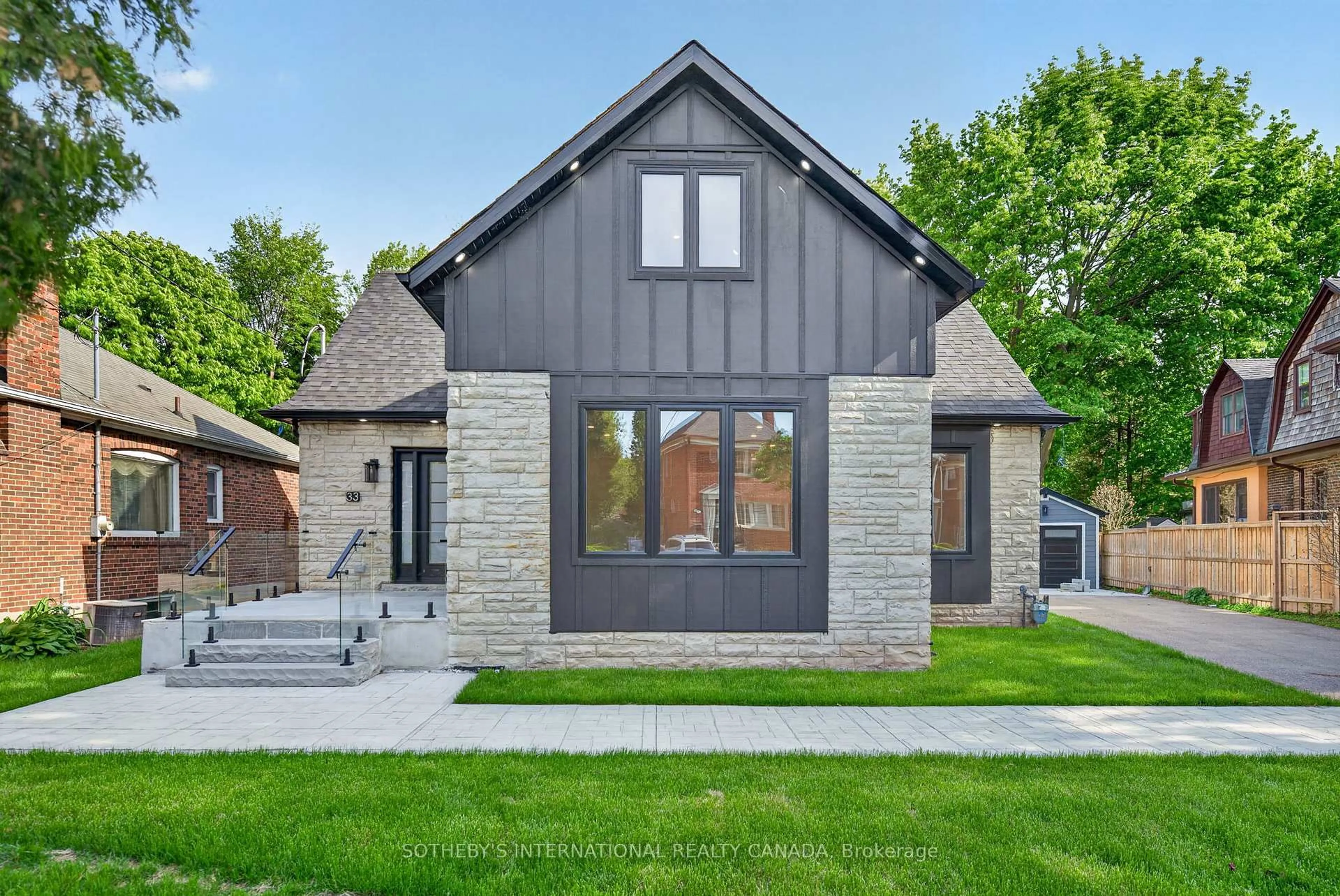 Home with brick exterior material, street for 33 Miles Rd, Toronto Ontario M8V 1V4