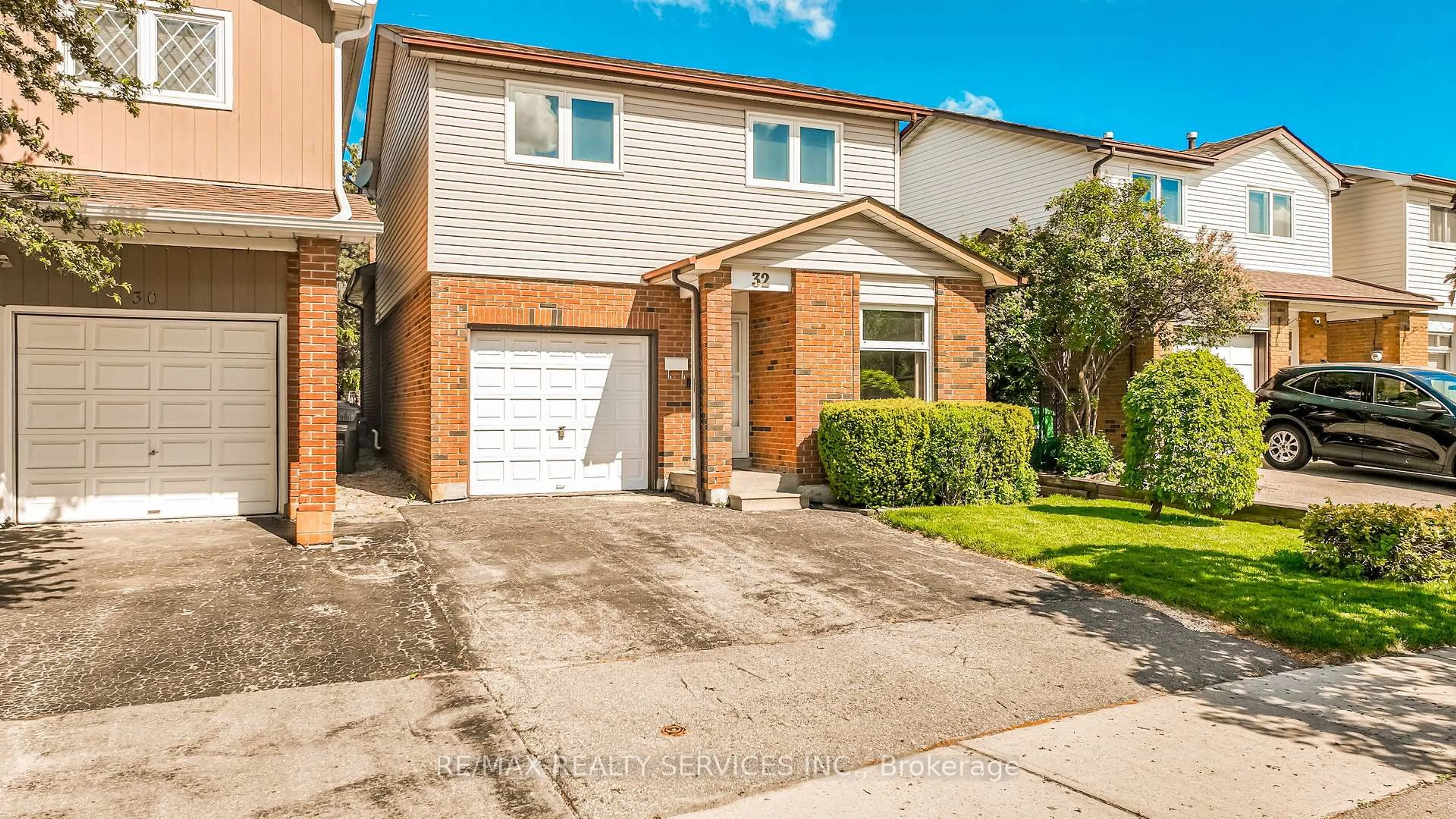 Home with brick exterior material, street for 32 Winterfold Dr, Brampton Ontario L6V 3T2
