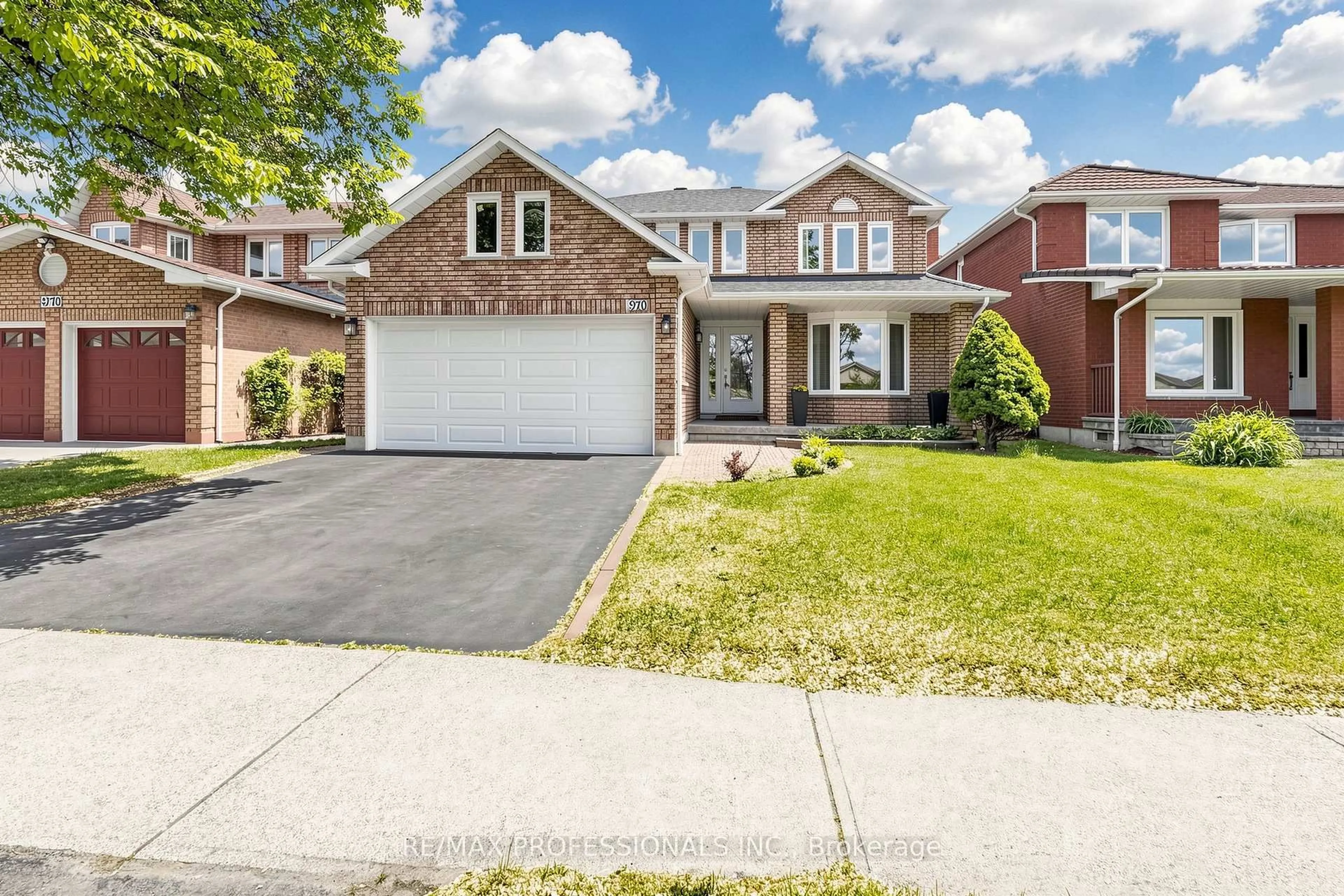 Home with brick exterior material, street for 970 Silversmith Dr, Mississauga Ontario L5V 1E7