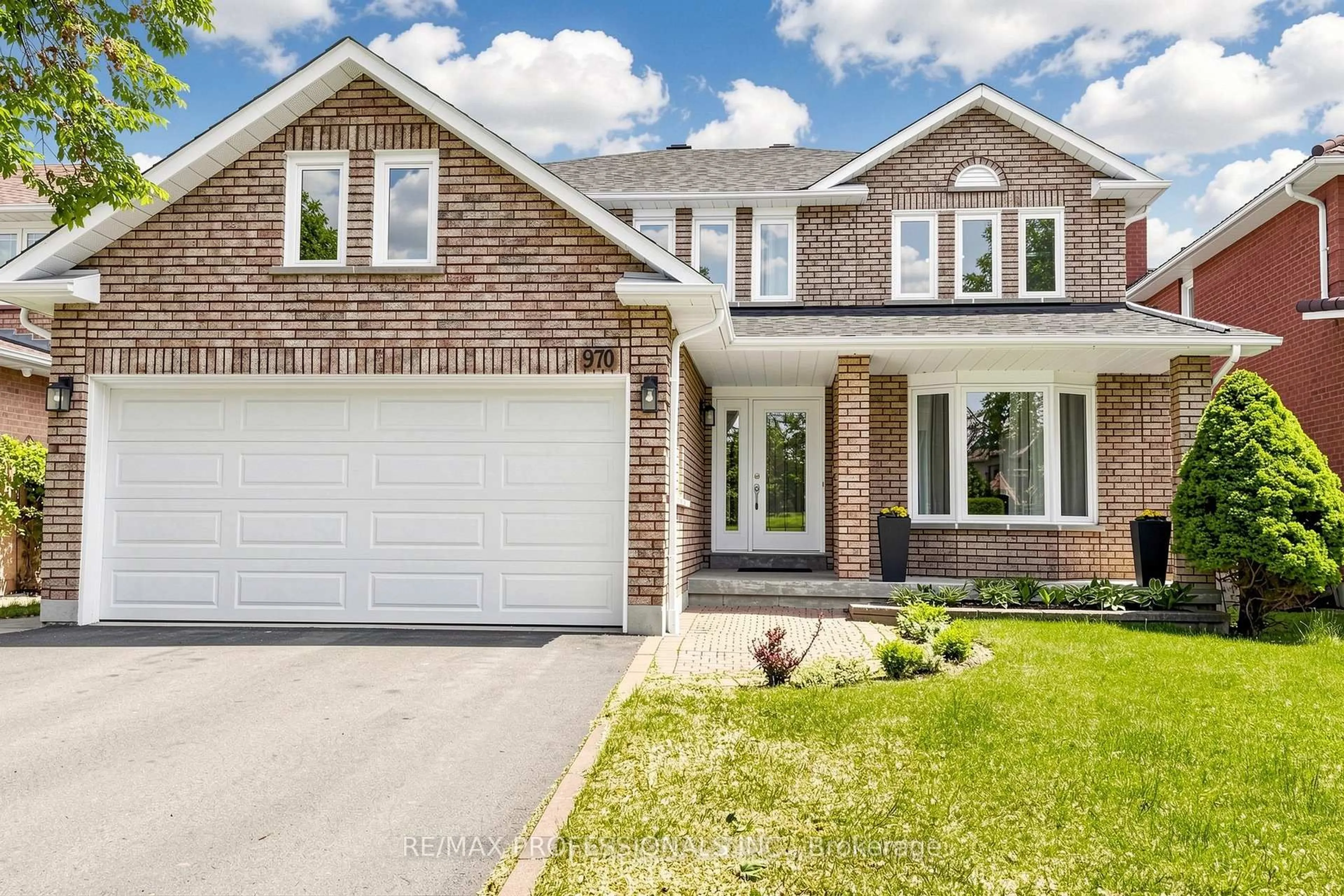Home with brick exterior material, street for 970 Silversmith Dr, Mississauga Ontario L5V 1E7