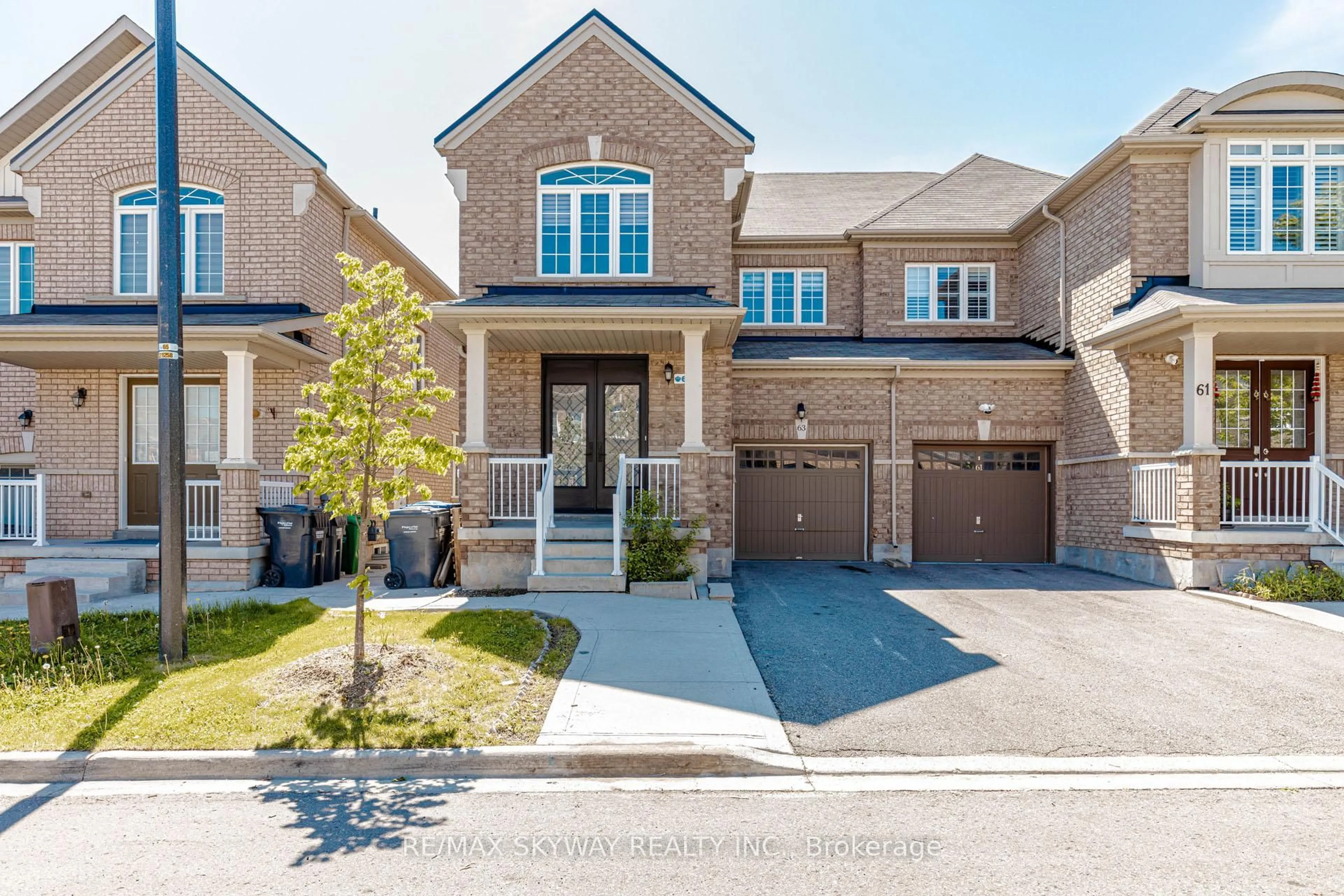 Home with brick exterior material, street for 63 Vezna Cres, Brampton Ontario L6X 5K5