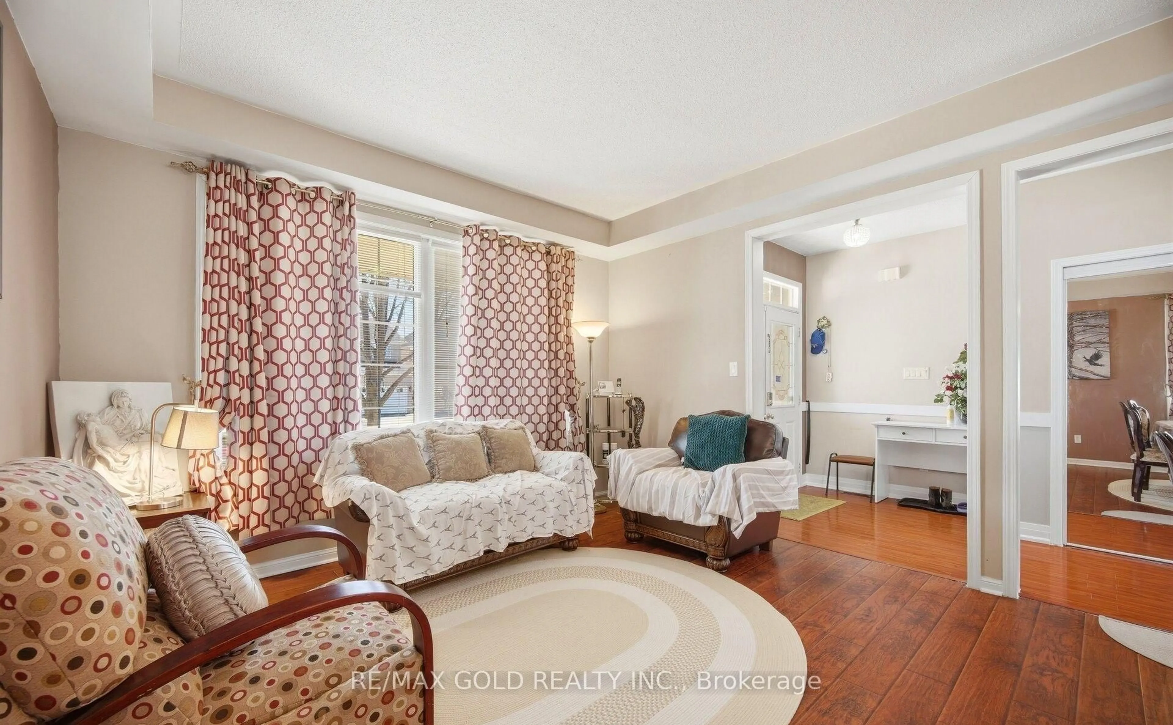 Living room with furniture, unknown for 28 Latania Blvd, Brampton Ontario L6P 1S9