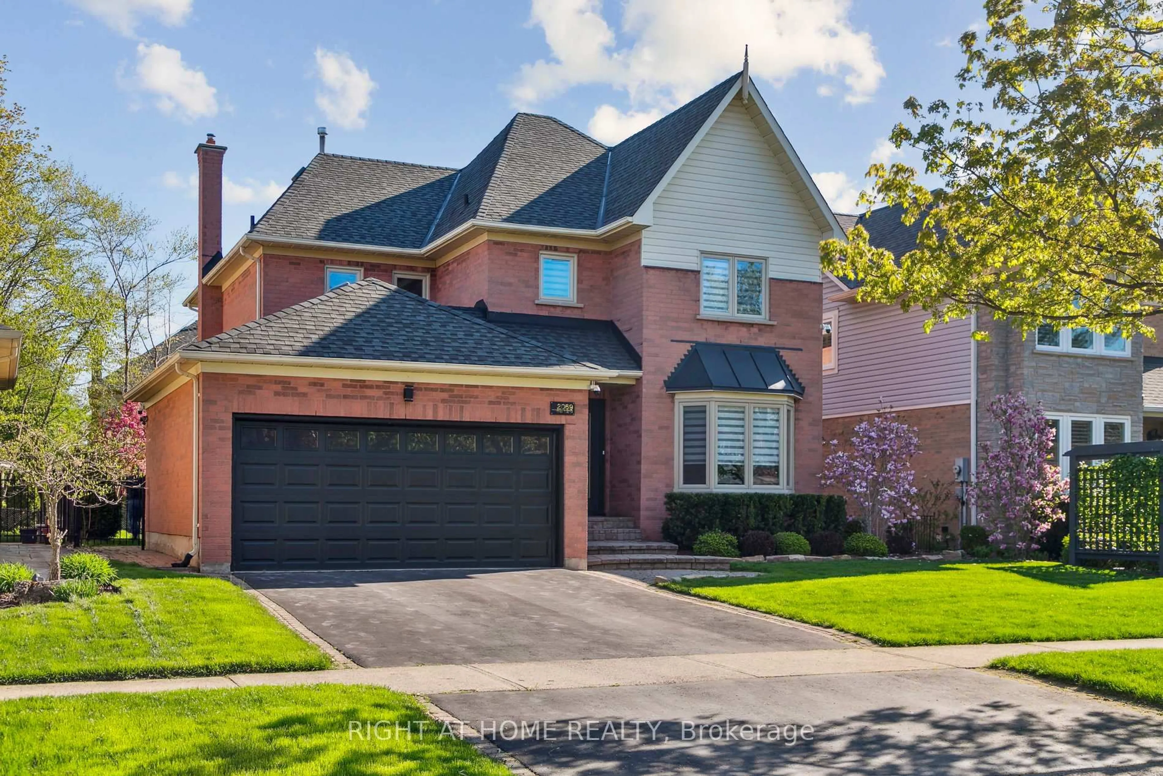 Home with brick exterior material, street for 2069 Waterbridge Dr, Burlington Ontario L7M 3W2