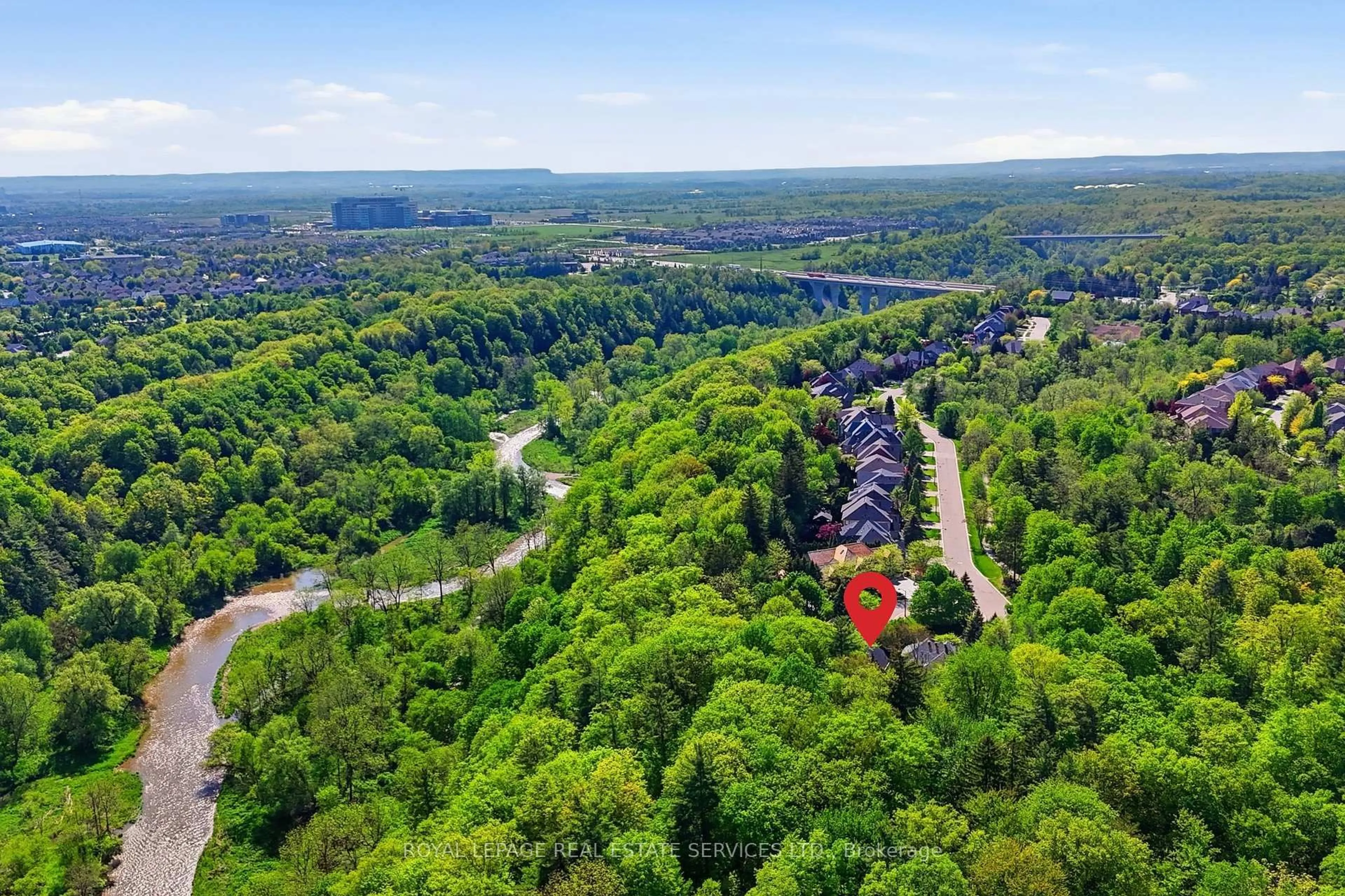 A pic from outside/outdoor area/front of a property/back of a property/a pic from drone, forest/trees view for 1227 Riverbank Way, Oakville Ontario L6H 6X4