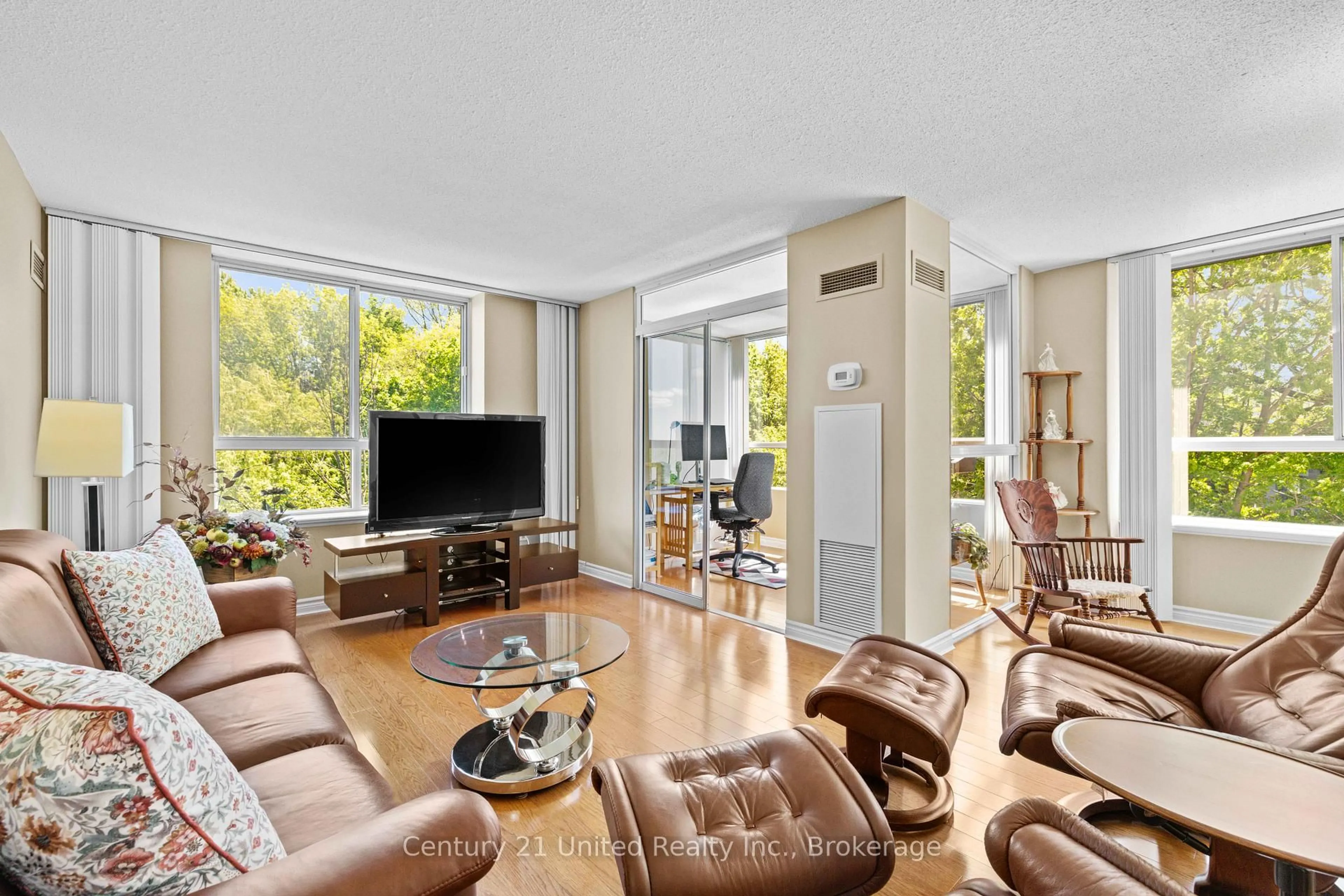 Living room with furniture, unknown for 1485 Lakeshore Rd #505, Mississauga Ontario L5E 3G2